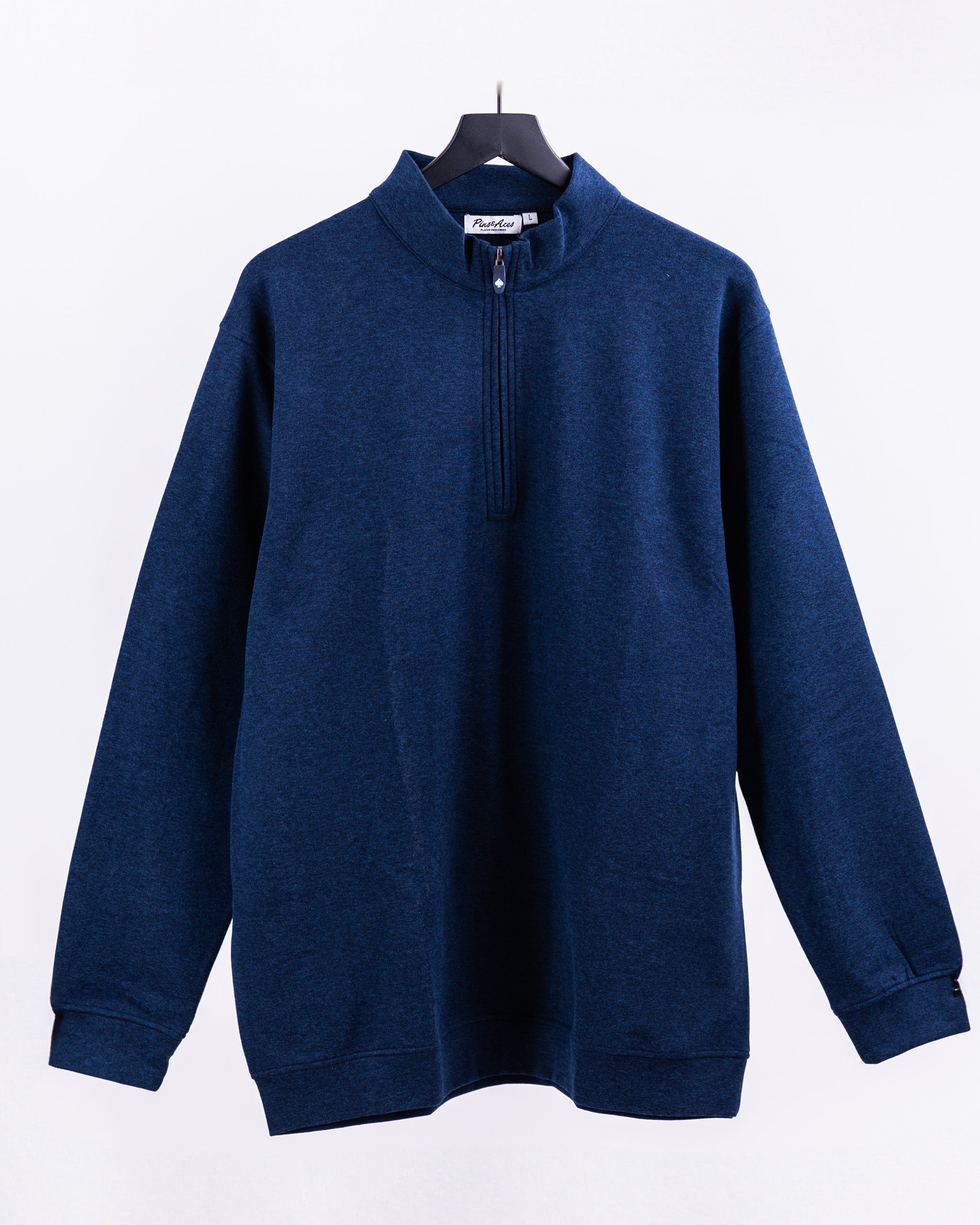 Heathered navy Player Preferred pullover with a half-zip collar, designed for comfort and style on the golf course.