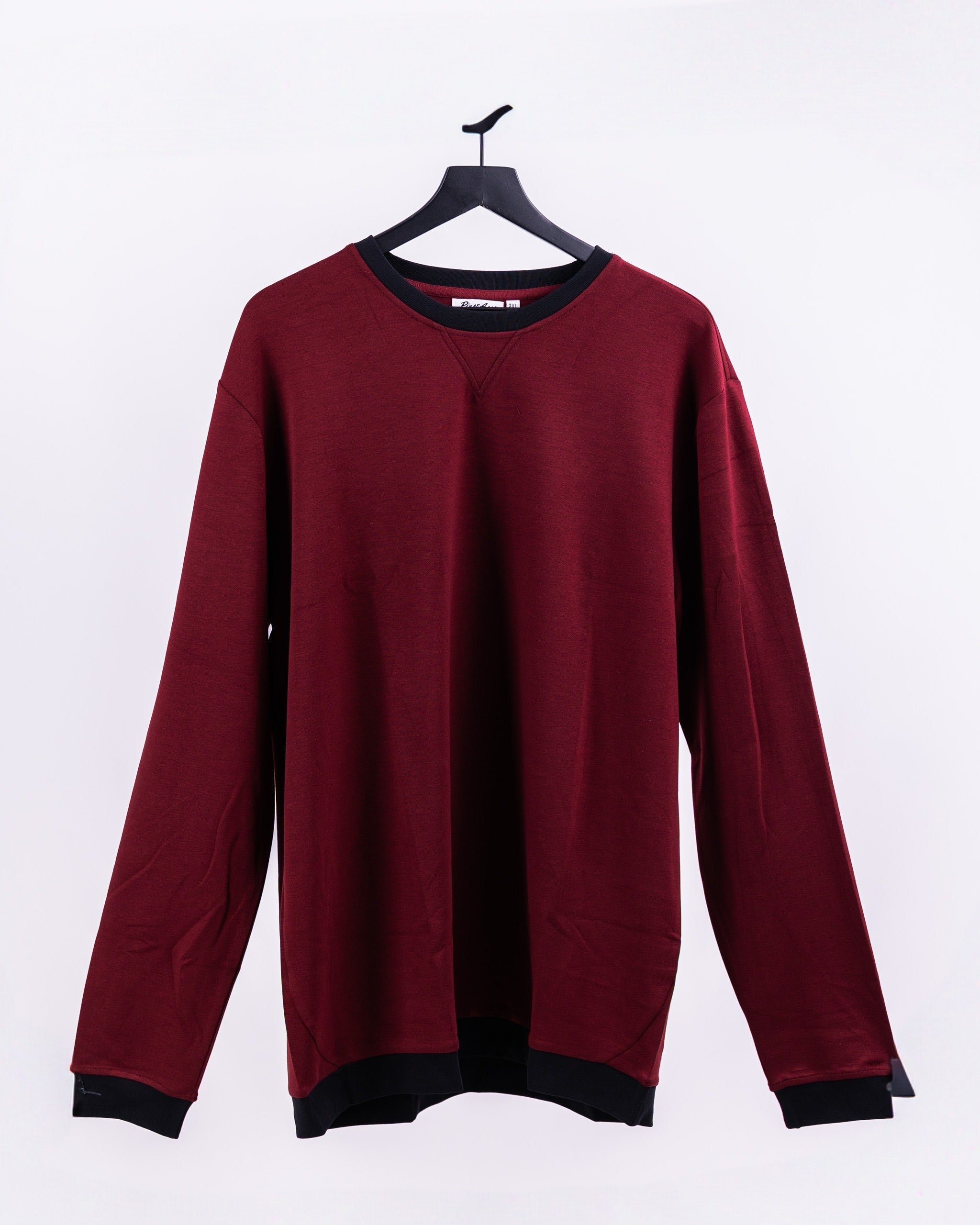 Player Preferred Crewneck in Merlot features a relaxed fit and soft fabric, perfect for stylish comfort on and off the golf course.