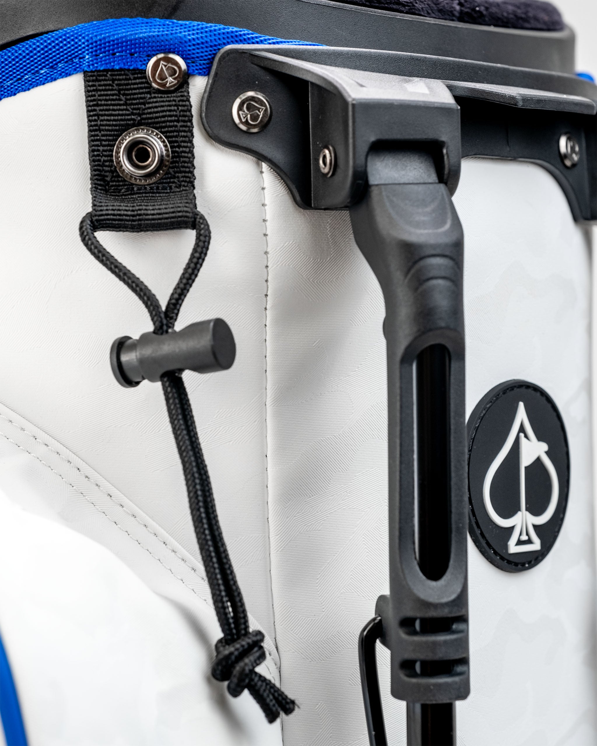Close-up of the Player Preferred Golf Bag featuring a durable handle, secure straps, and a stylish logo, ideal for golfers.