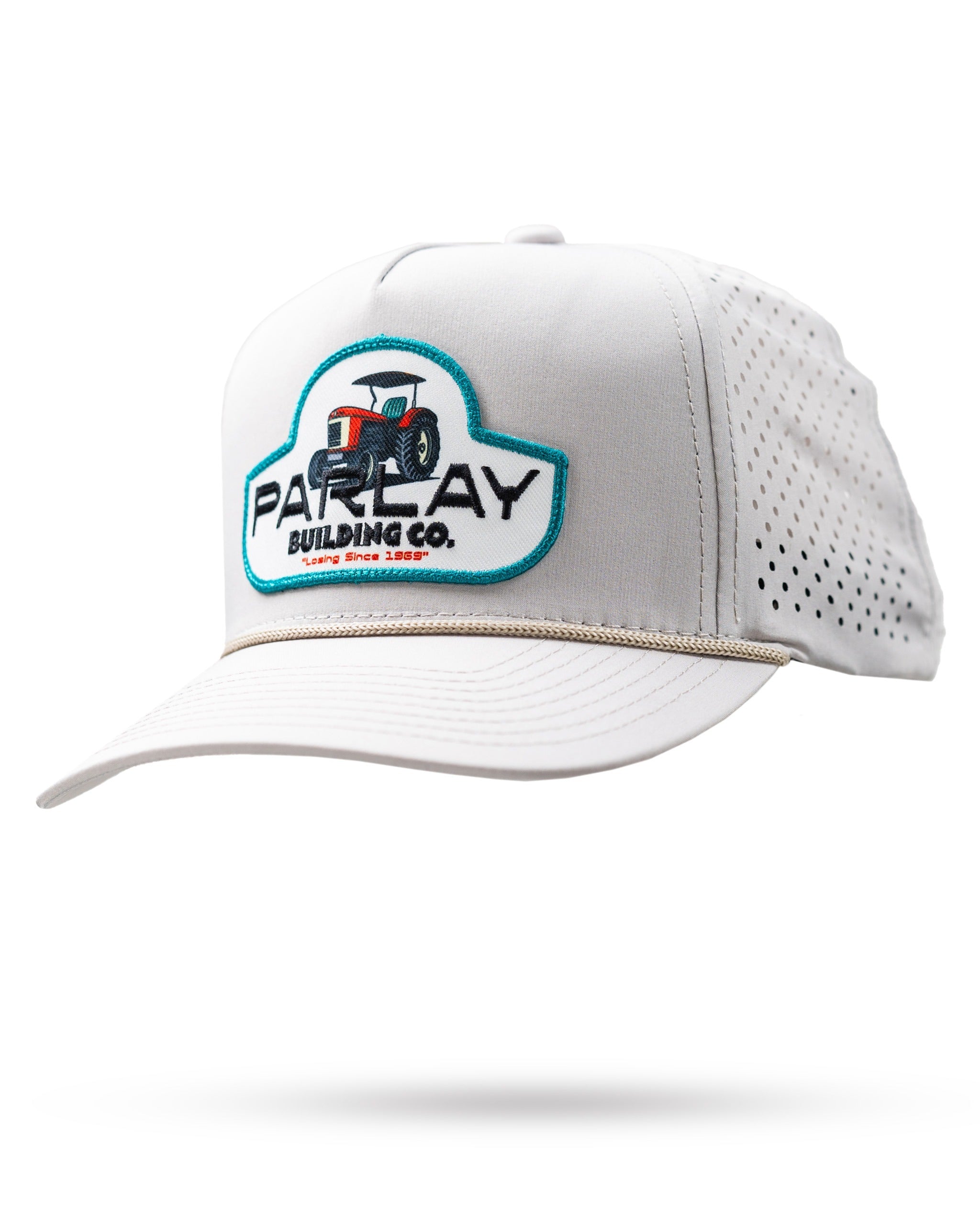 Perforated rope hat in bone color featuring Parlay Building Co. logo with tractor design for a stylish, sporty look.