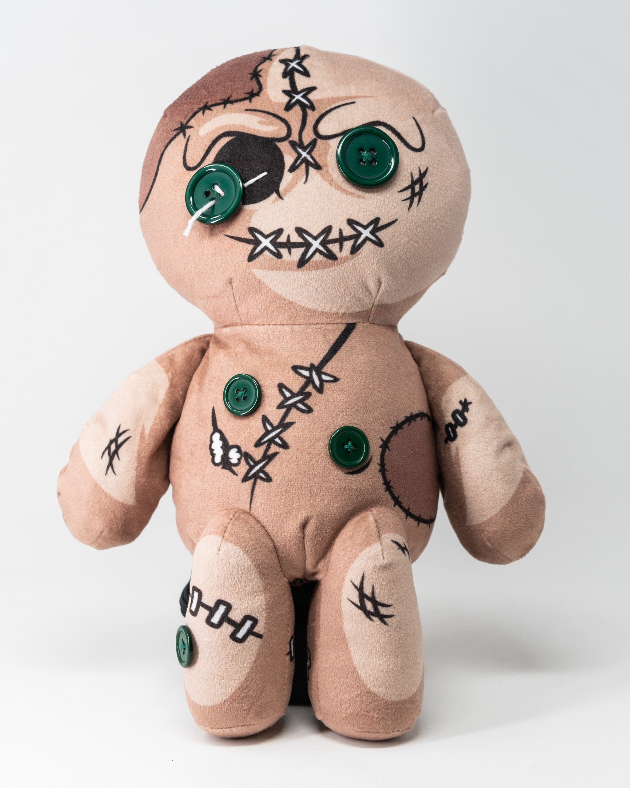 Voodoo doll driver cover featuring a plush design with stitched details and button eyes for a unique golf accessory.