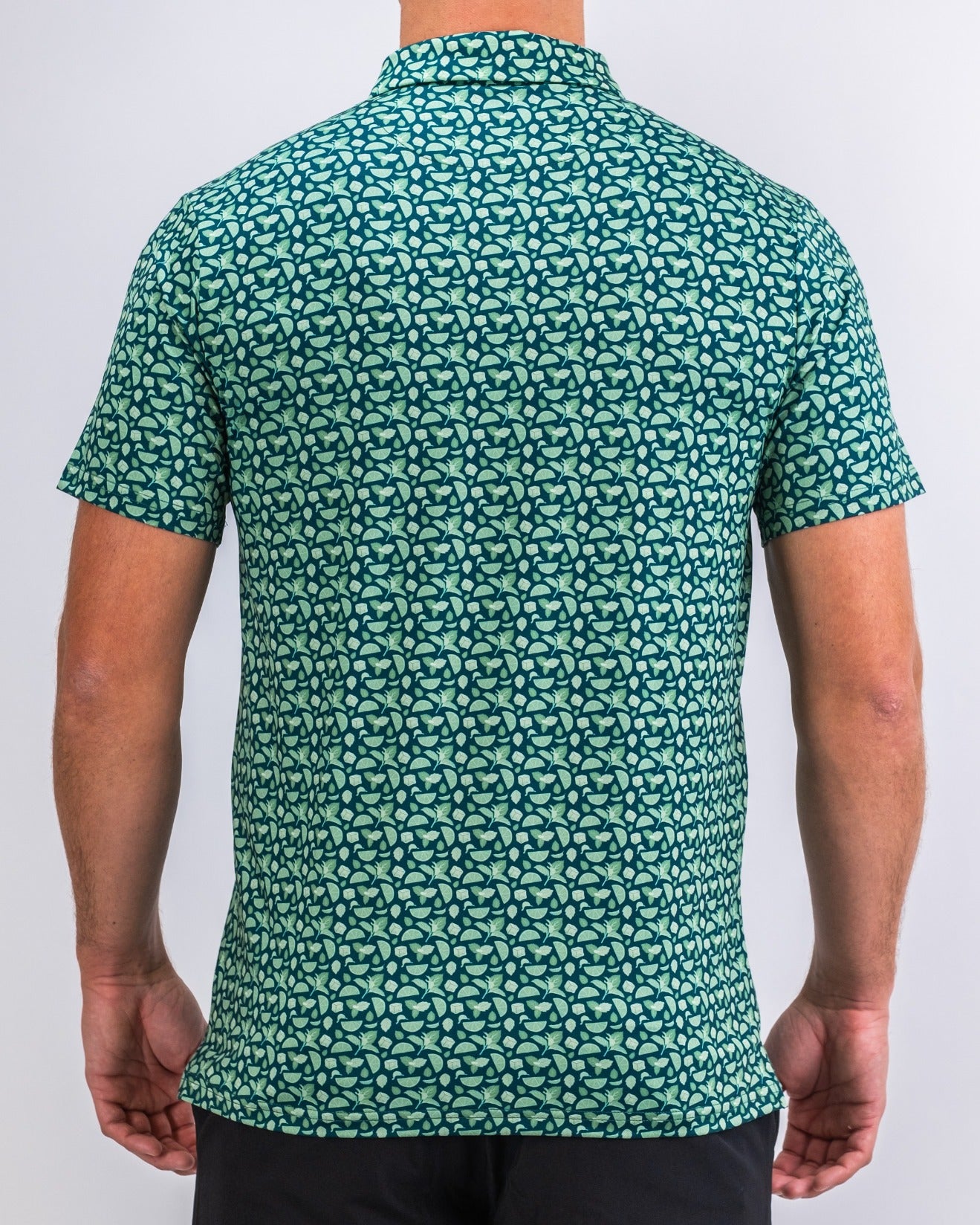 Men's short-sleeve golf shirt in mint green with a unique pattern, designed for a stylish look on the course.