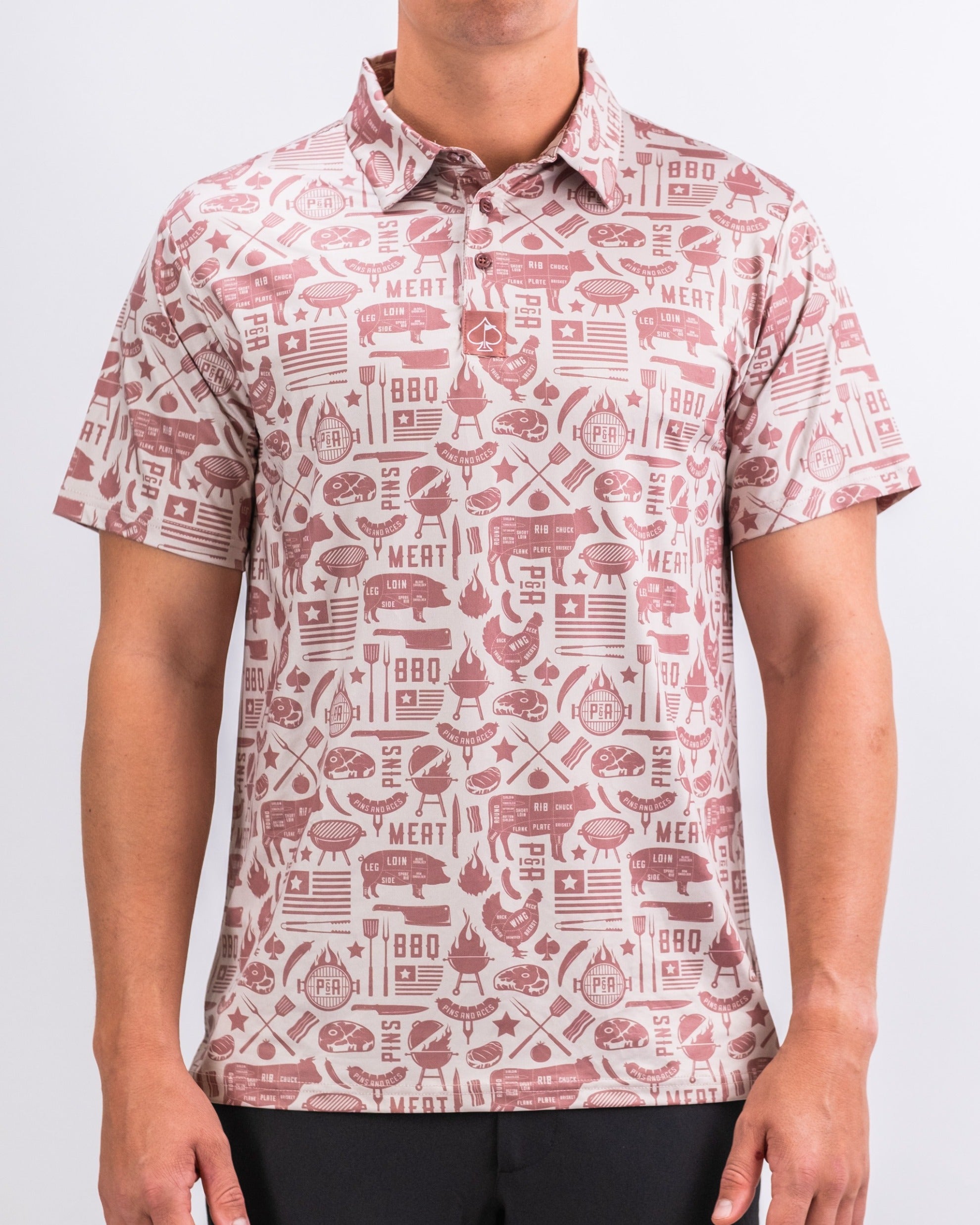 Men's golf shirt featuring a barbecue-themed print with various grill and meat graphics in earthy tones.