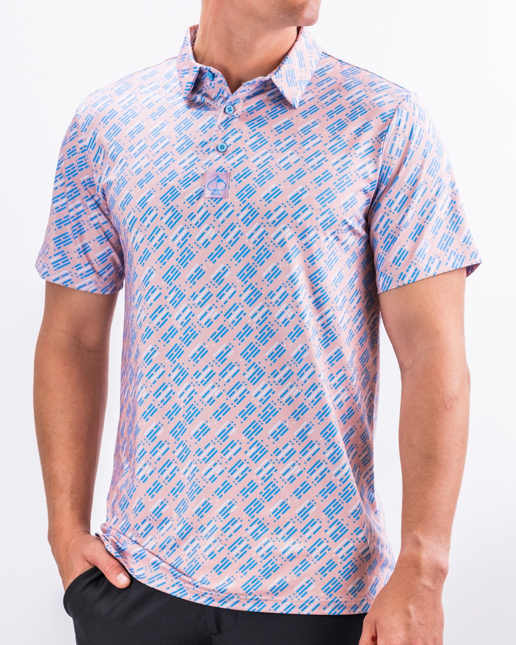 Men's Skyline Dash Pink golf polo featuring a vibrant geometric pattern in pink and blue, perfect for stylish play on the course.