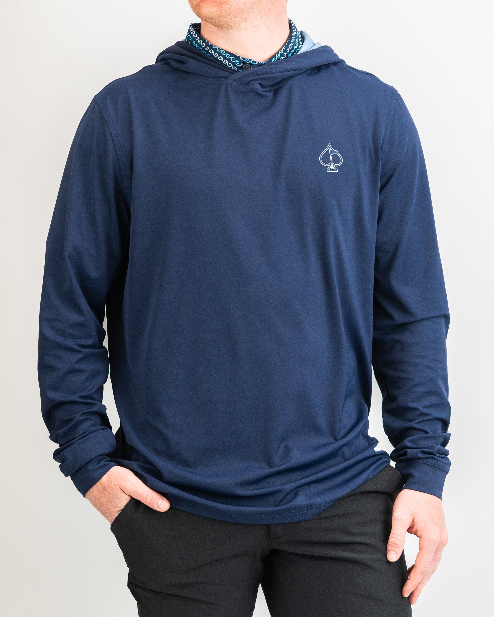 Navy performance golf hoodie featuring a logo, designed for comfort and style on the golf course. Ideal for active wear.