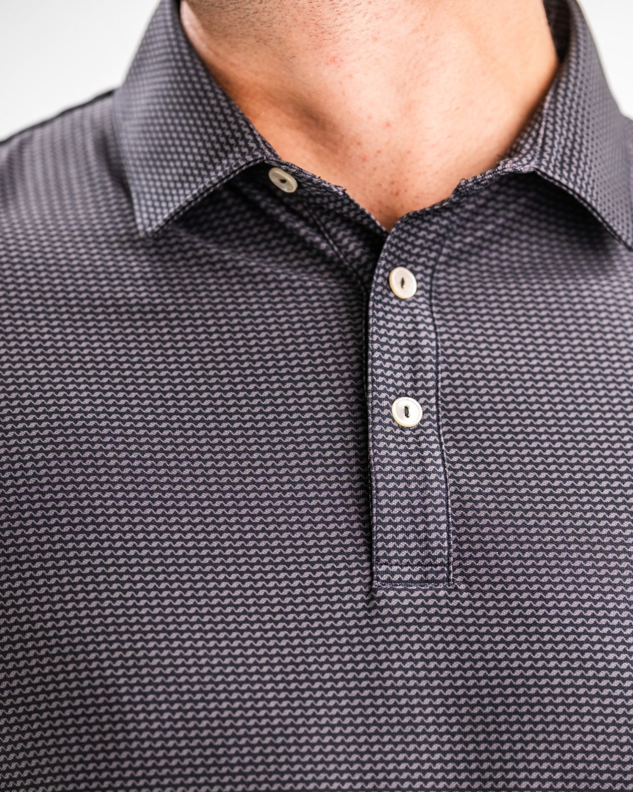 Men's Player Preferred Polo in Night Wave features a textured pattern and classic collar for a stylish golf look.