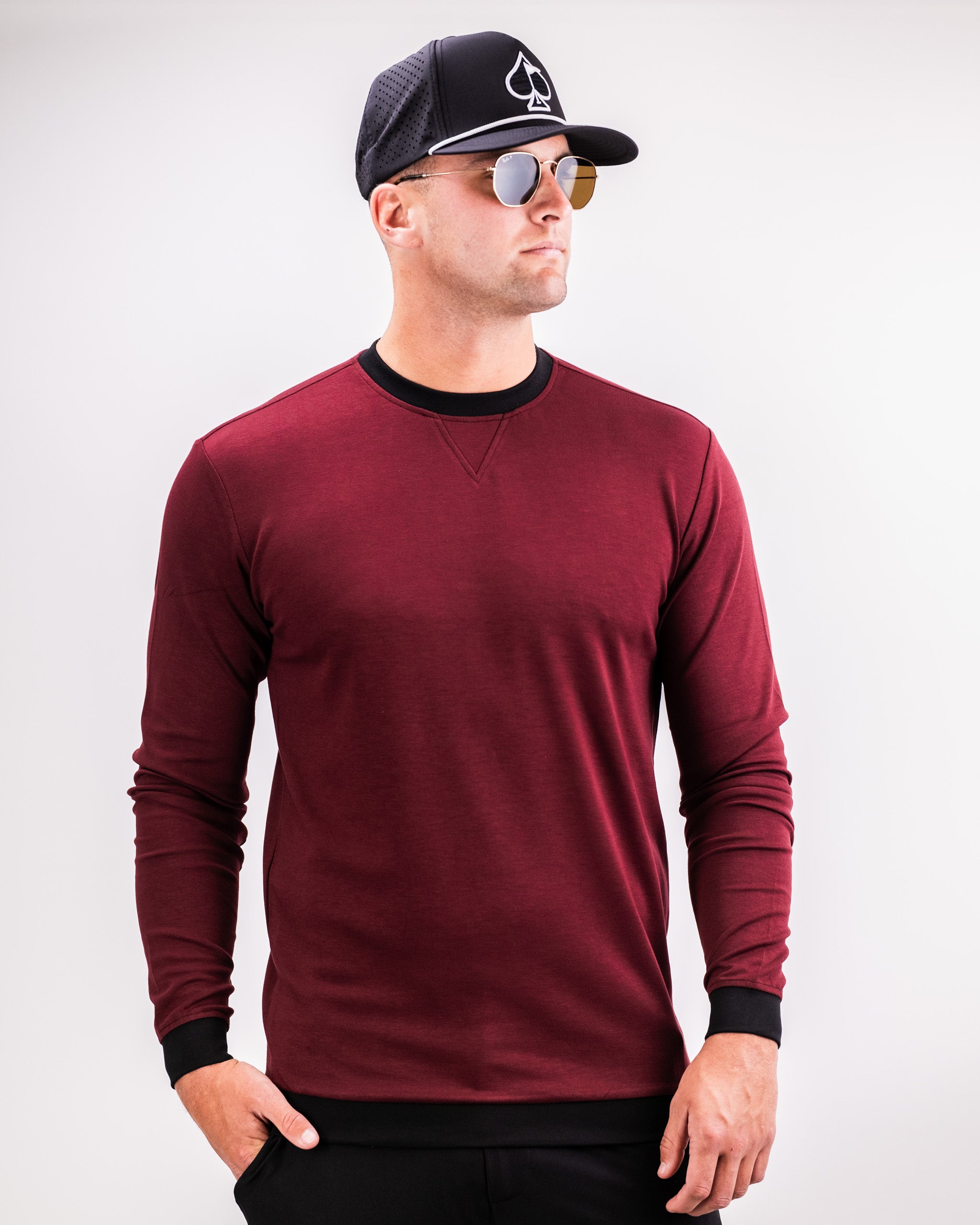 Men's Player Preferred Crewneck in Merlot, featuring a classic fit and stylish black accents, perfect for golf enthusiasts.