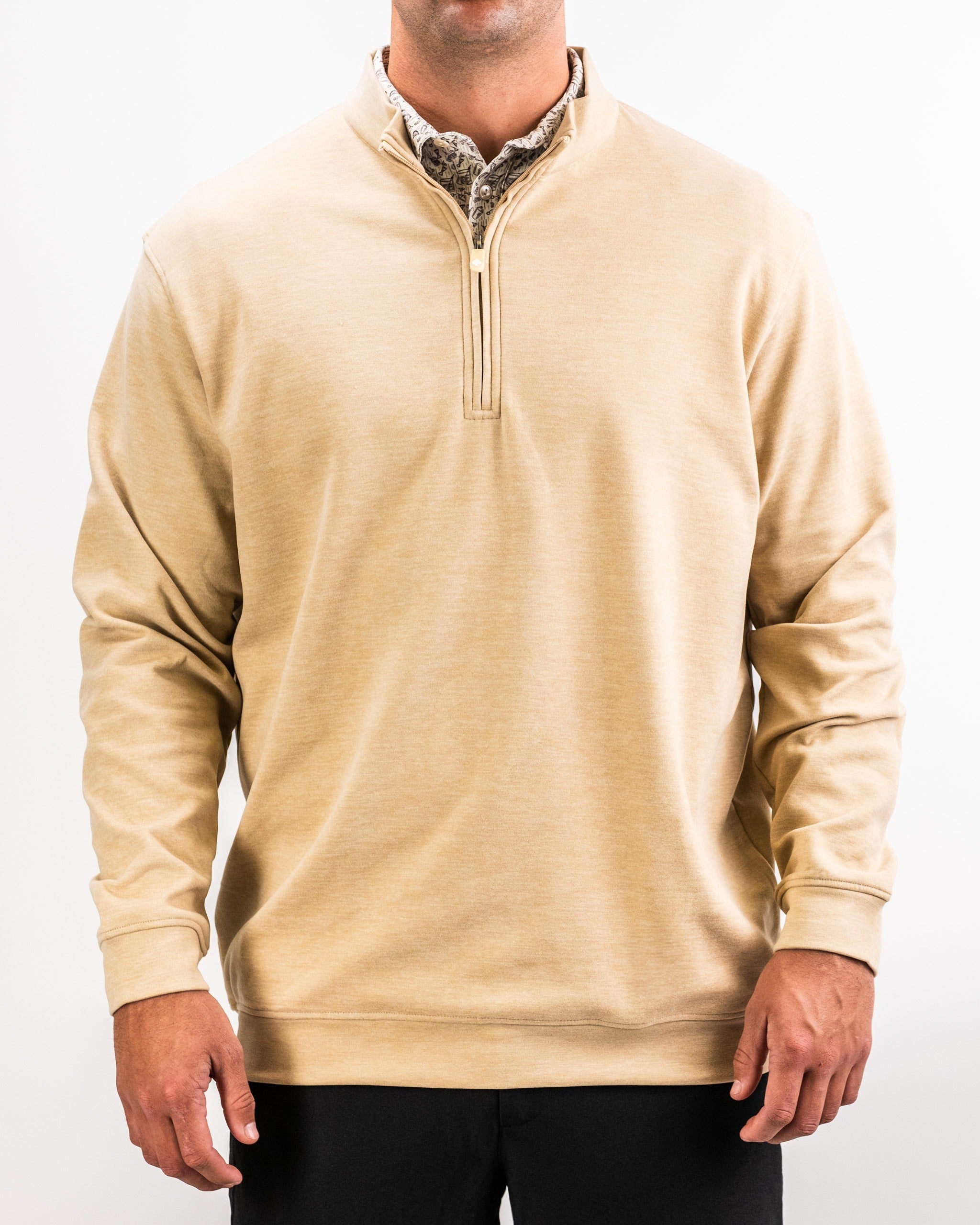 Men's Player Preferred Pullover in sand color, featuring a half-zip design and relaxed fit for comfort on the golf course.