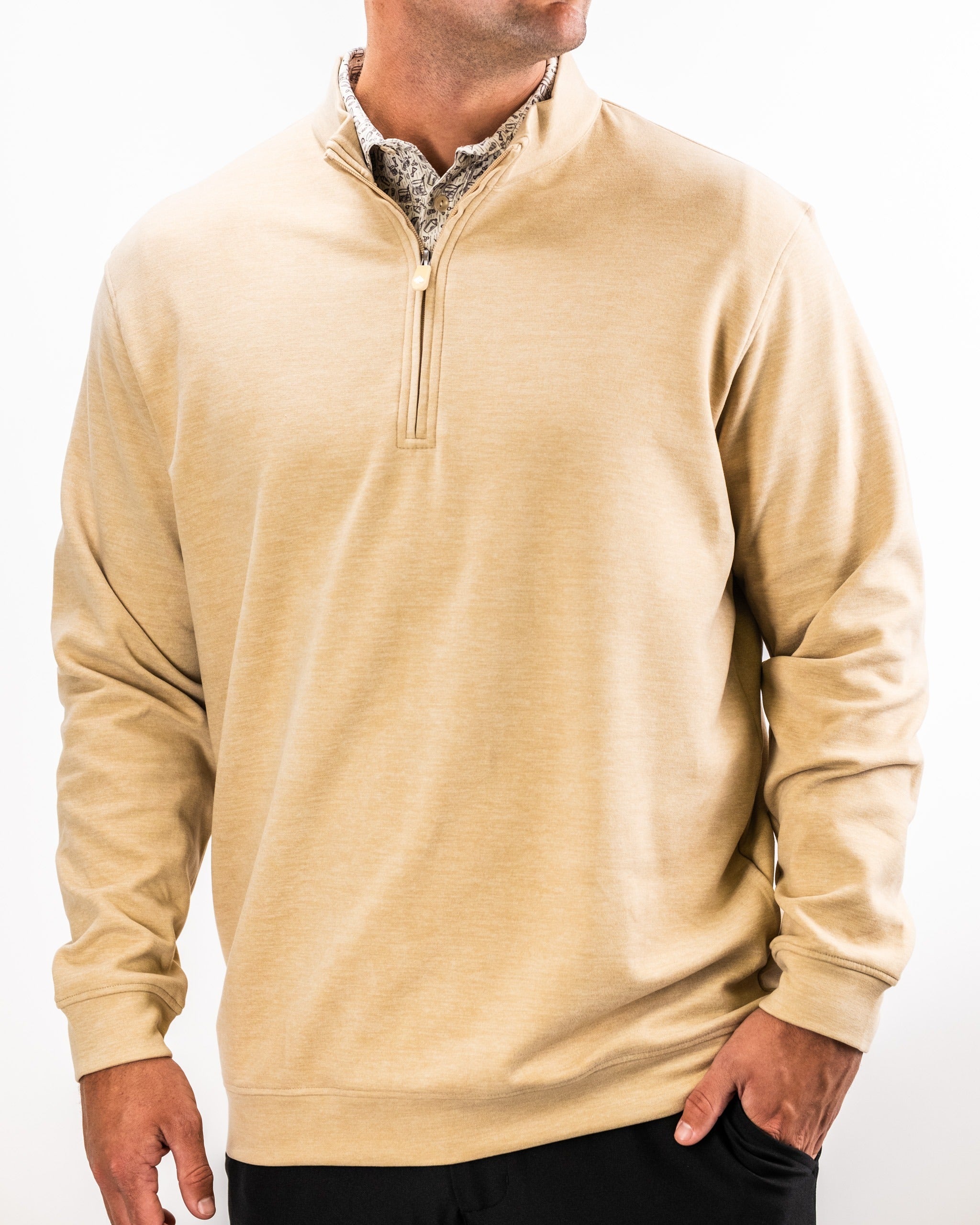 Men's Player Preferred Pullover in sand color, featuring a half-zip design and a relaxed fit for comfortable golfing.