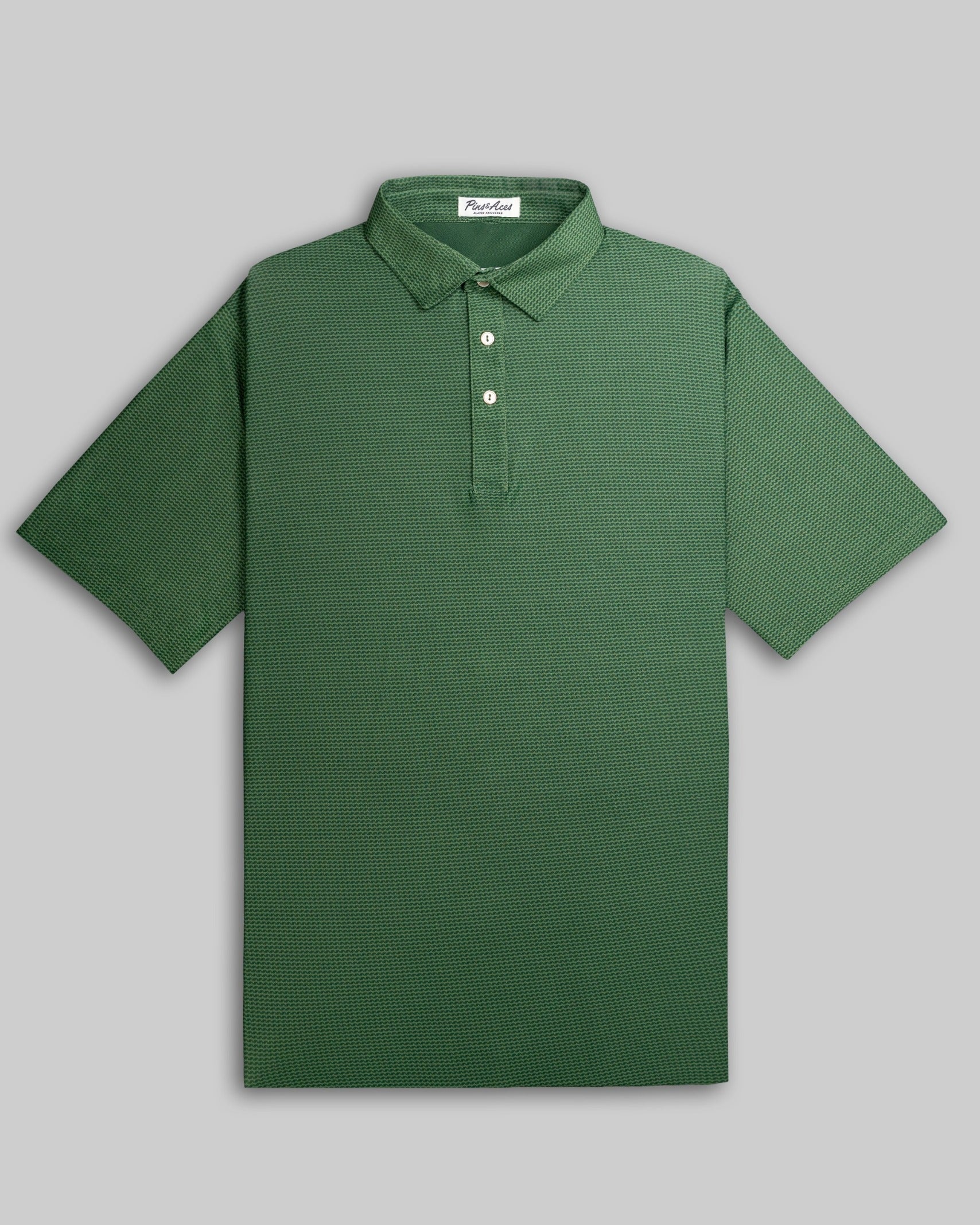 Forest green polo shirt with a subtle pattern, featuring a classic collar and three-button placket, ideal for golfers.