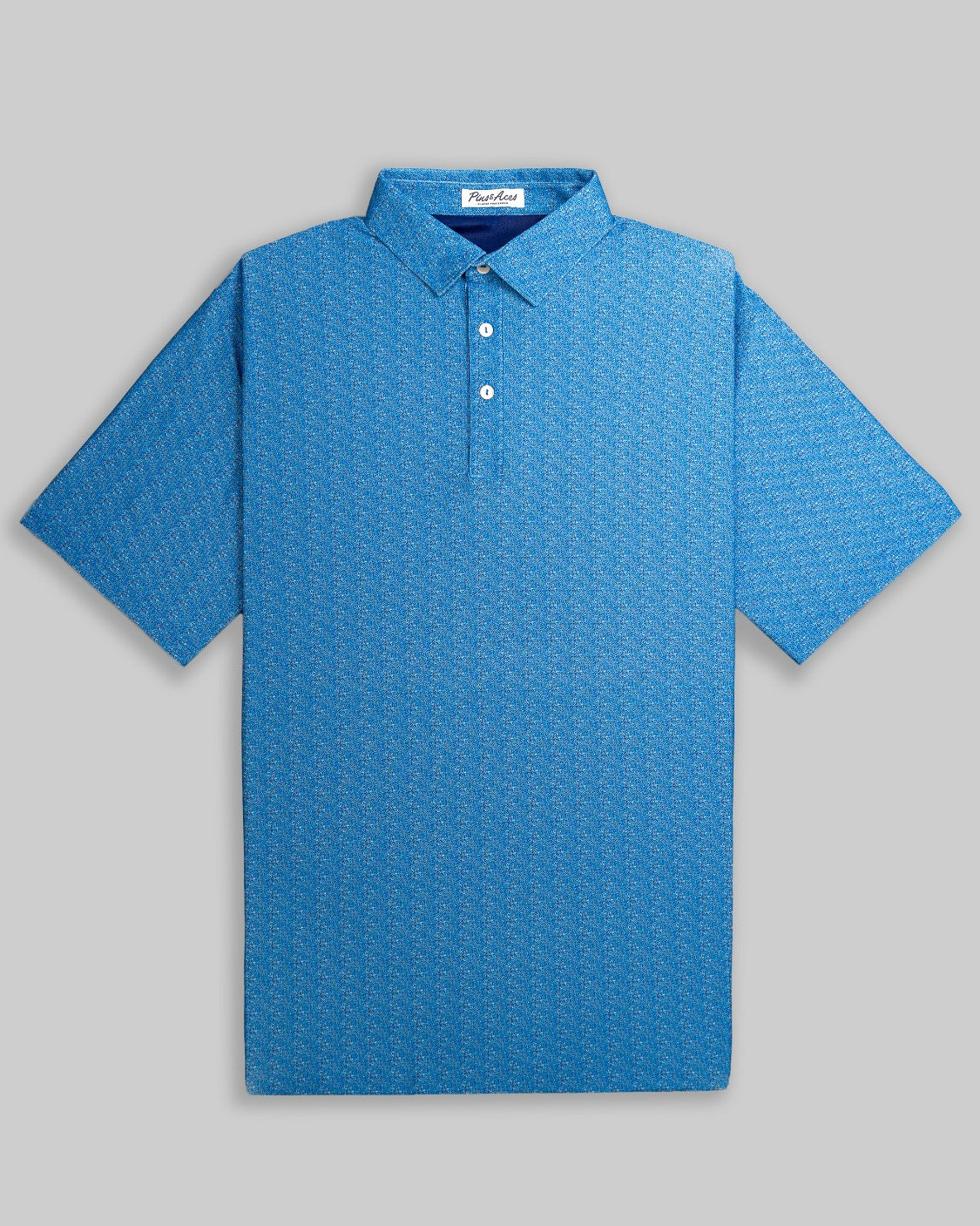 Player Preferred Polo in Cosmic Swirl features a vibrant blue pattern, ideal for golfers seeking stylish performance on the course.