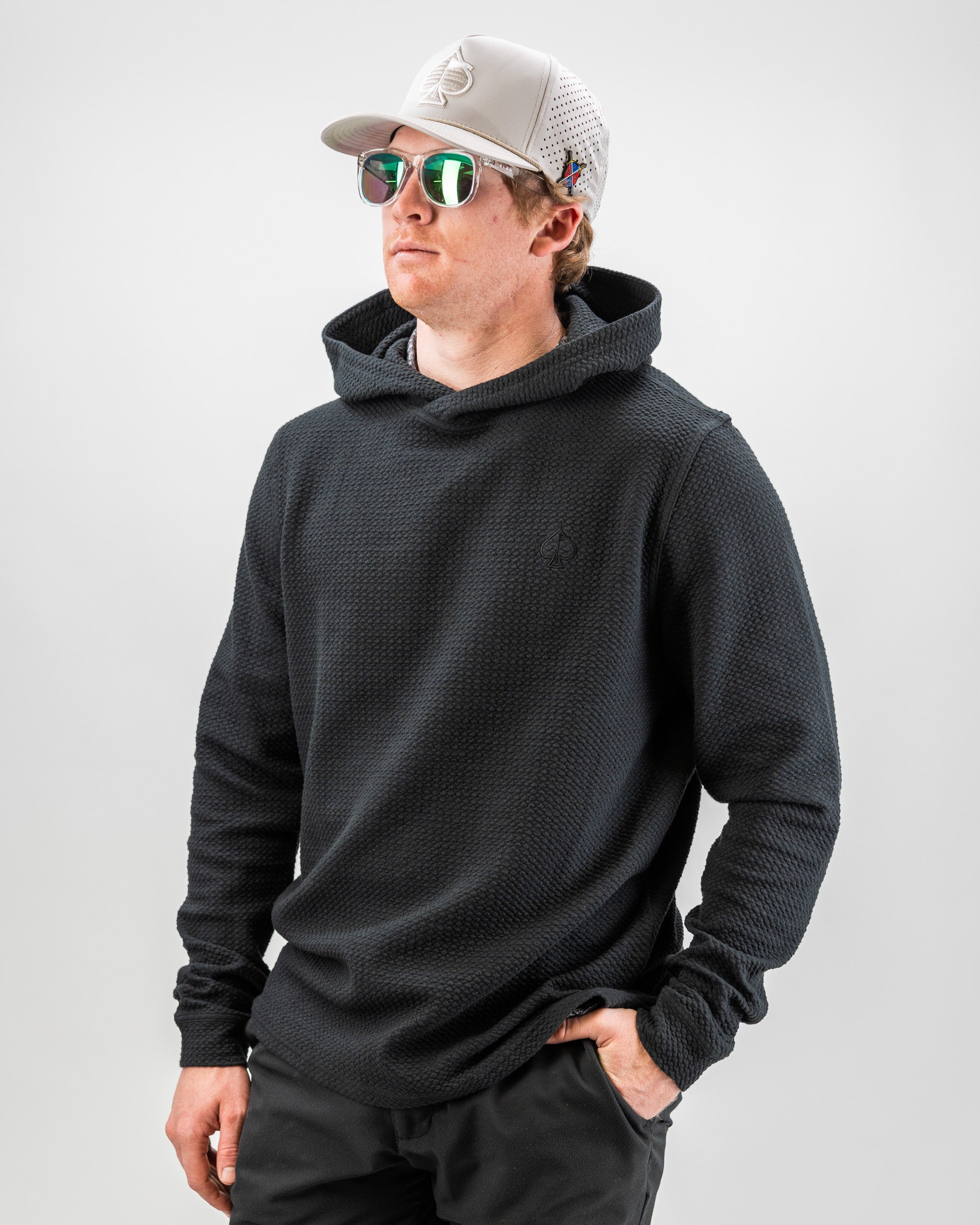 Player Preferred Waffle Knit Hoodie in Obsidian, featuring a relaxed fit, hood, and stylish design for golfers.