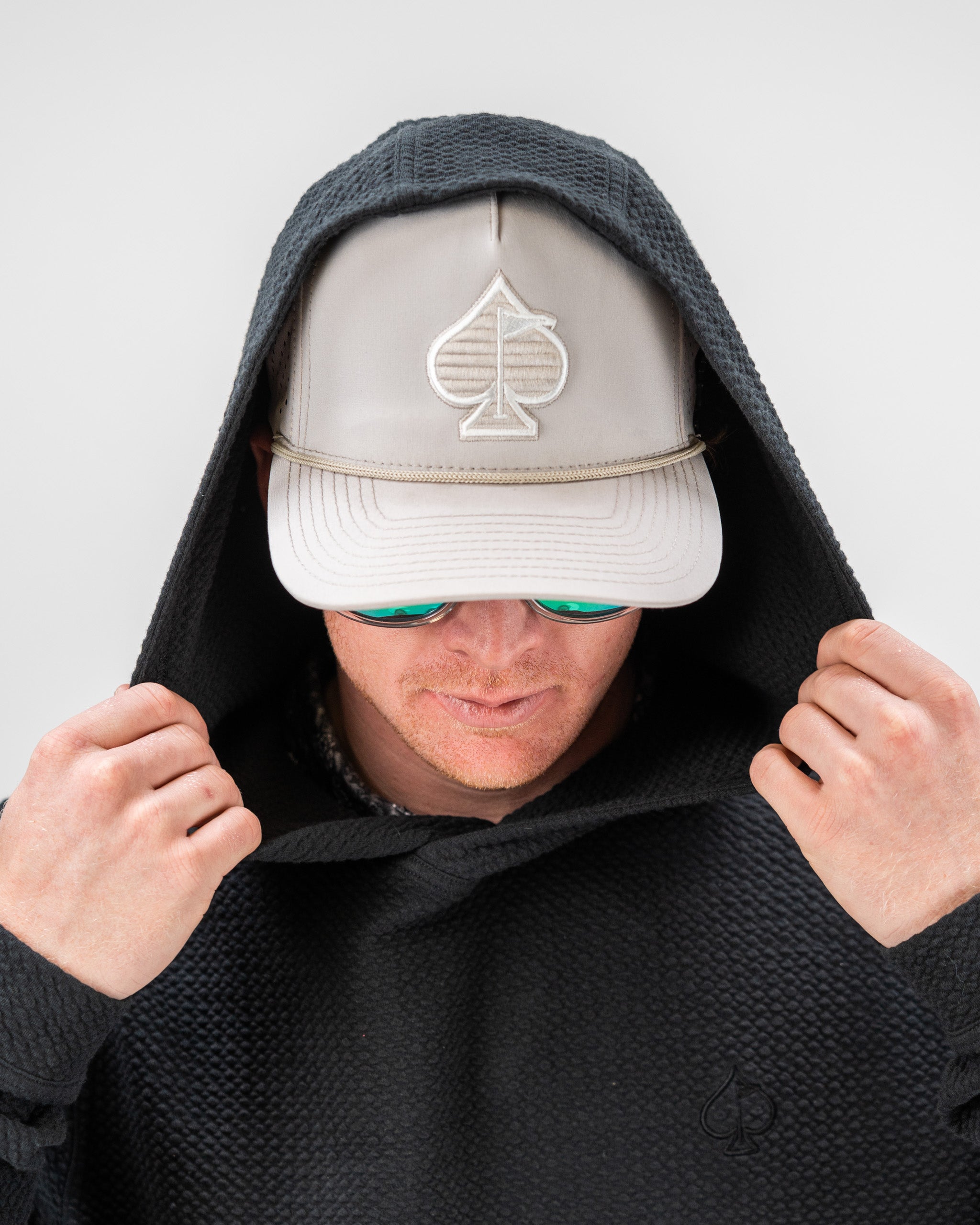 Player Preferred Waffle Knit Hoodie in Obsidian, featuring a hooded design and a stylish look for golfers.
