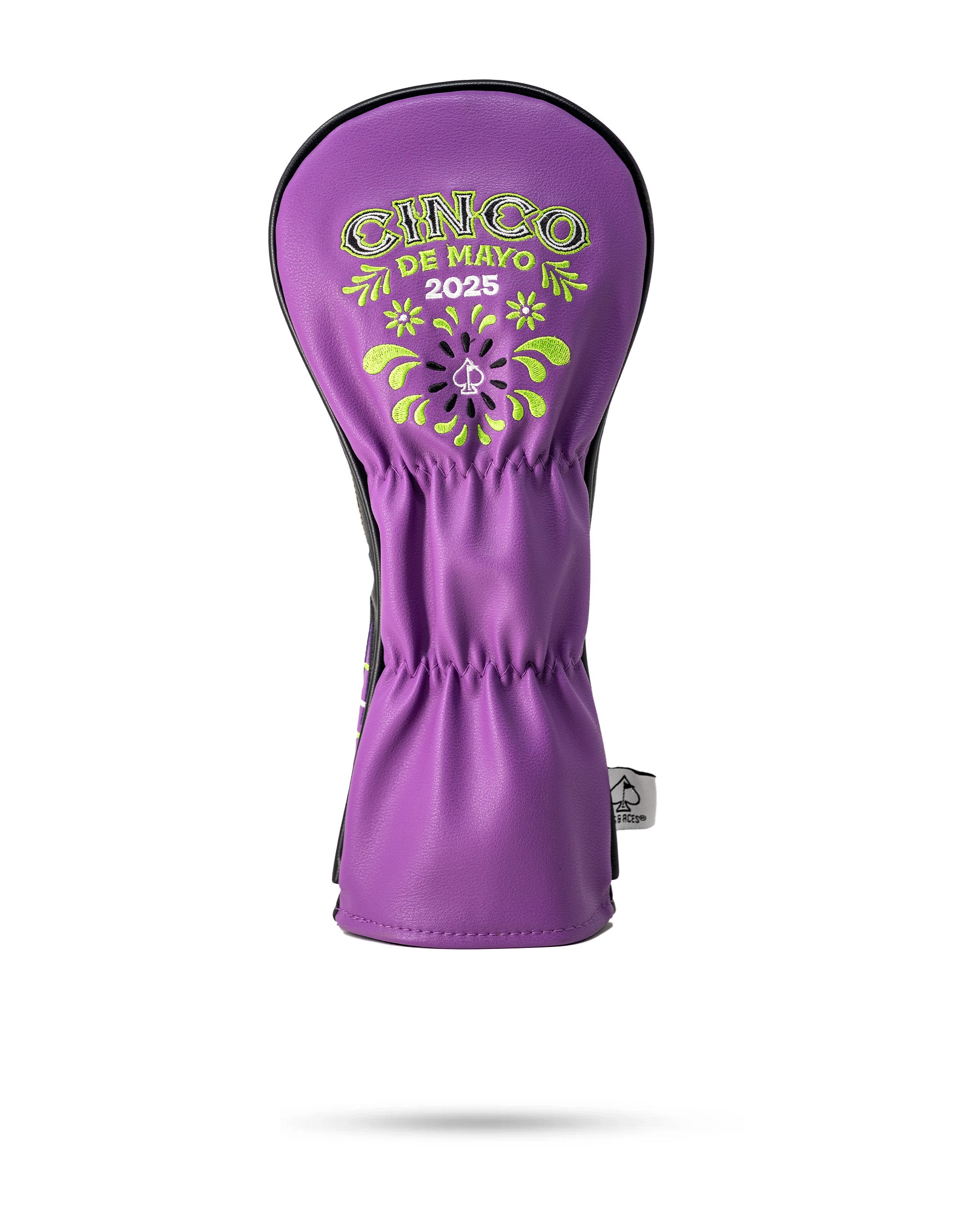 Lucha Libre mask-inspired fairway cover in vibrant purple with Cinco de Mayo 2025 embroidery for bold golf style.