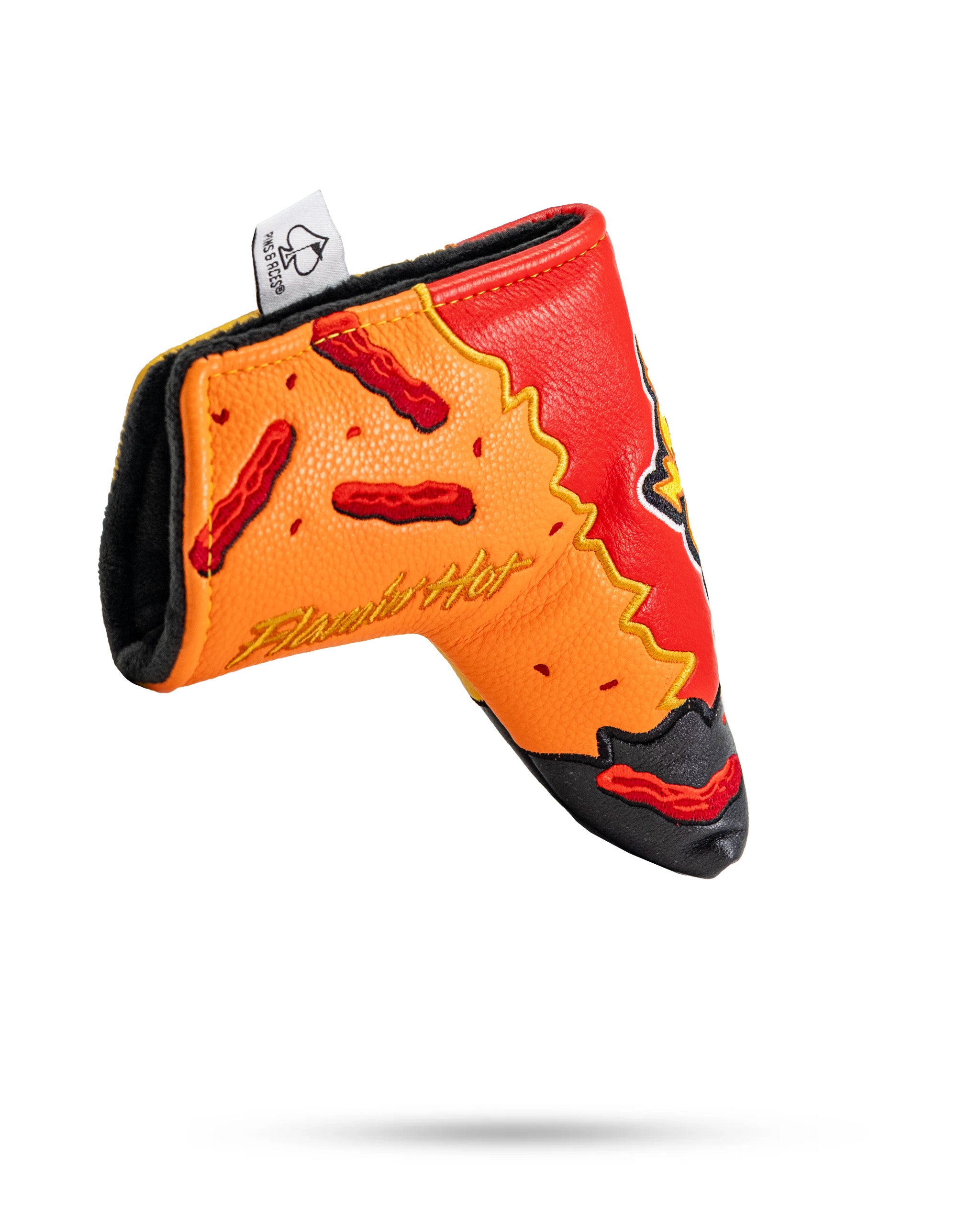 Bold Flamin' Hot Cheaters blade putter cover featuring vibrant red and orange design with playful chili pepper accents.