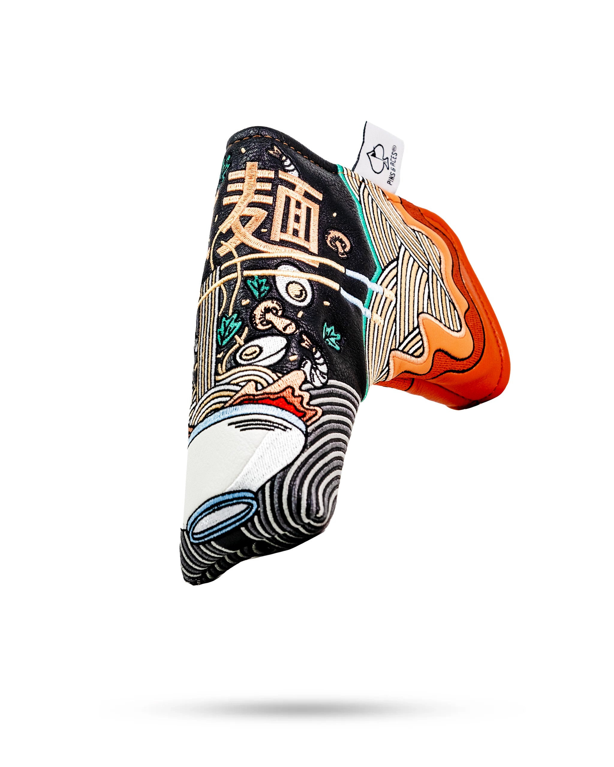 Bold ramen-themed blade putter cover featuring vibrant colors and intricate designs, perfect for golfers wanting to stand out.