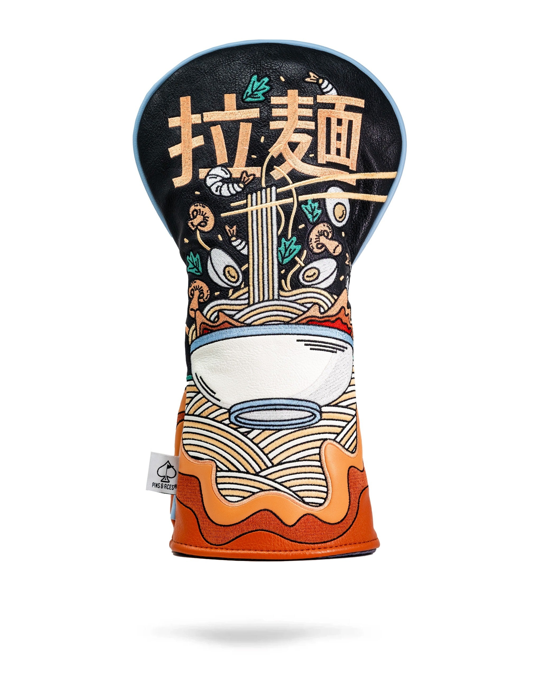 Bold ramen-themed driver cover featuring vibrant graphics of noodles and a bowl, perfect for unique golf style.