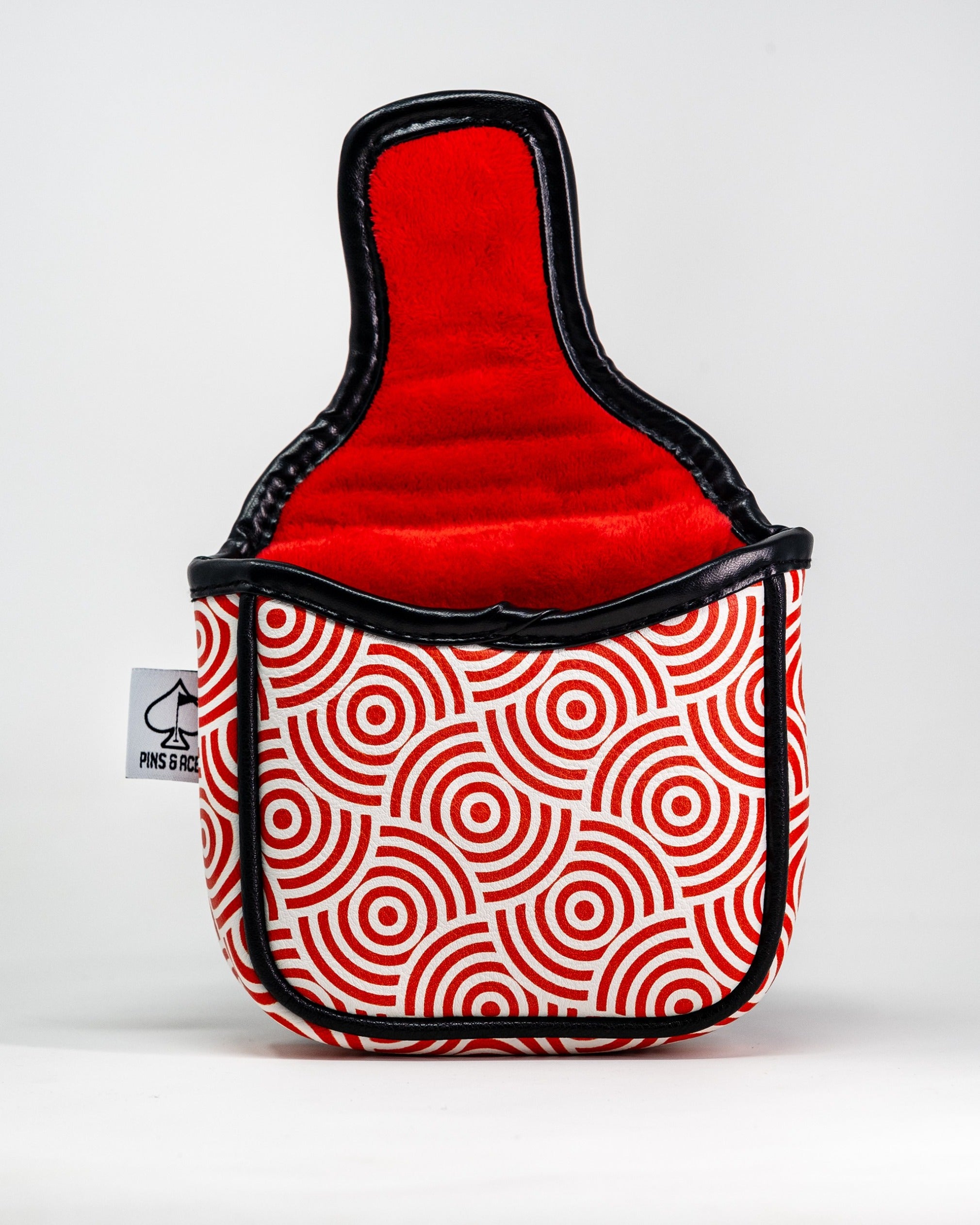 Bold red and white circular pattern mallet putter cover with soft interior, designed for stylish golf protection.