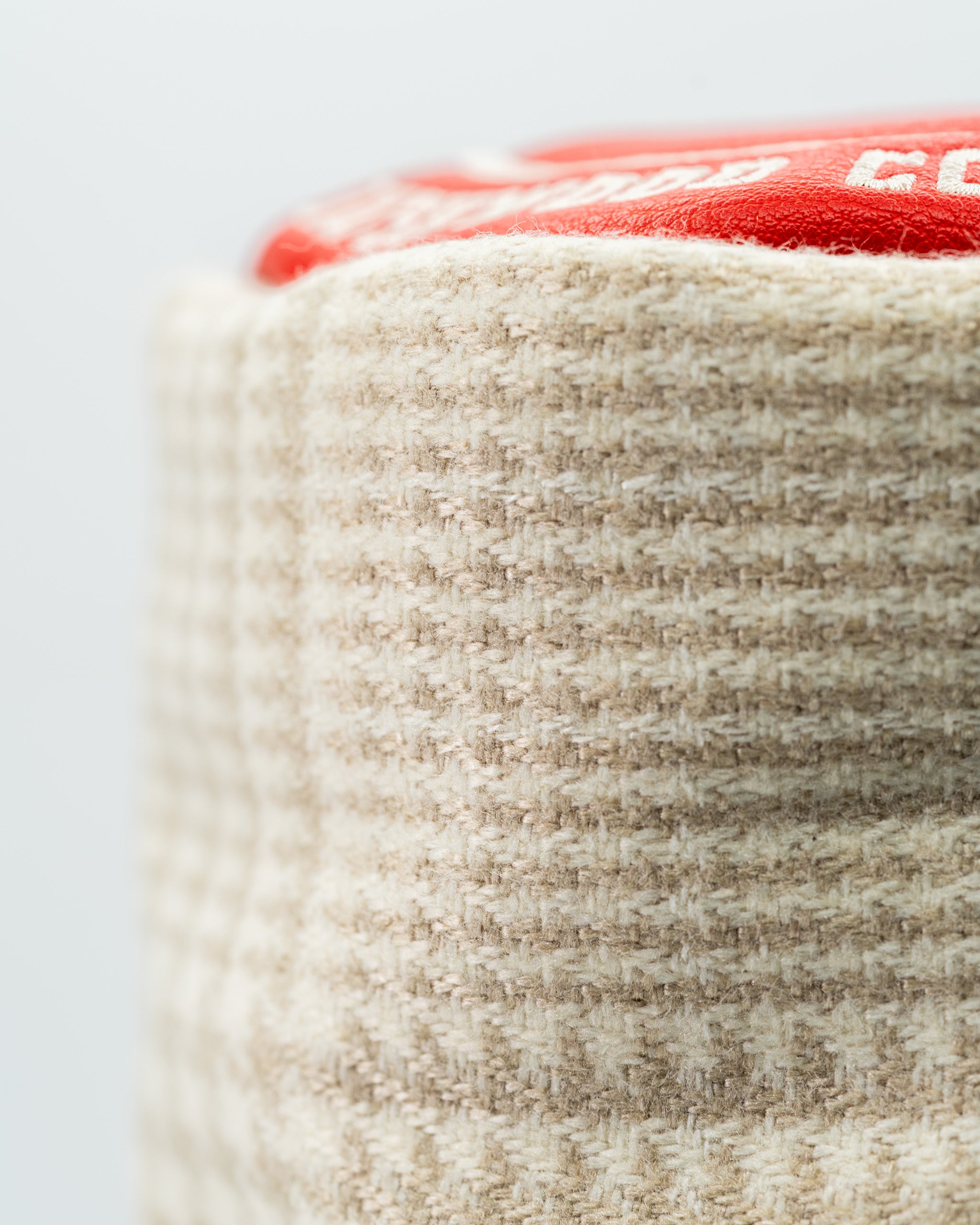 Bushwood CC driver cover featuring a textured beige fabric with a bold red top, designed for stylish golf protection.