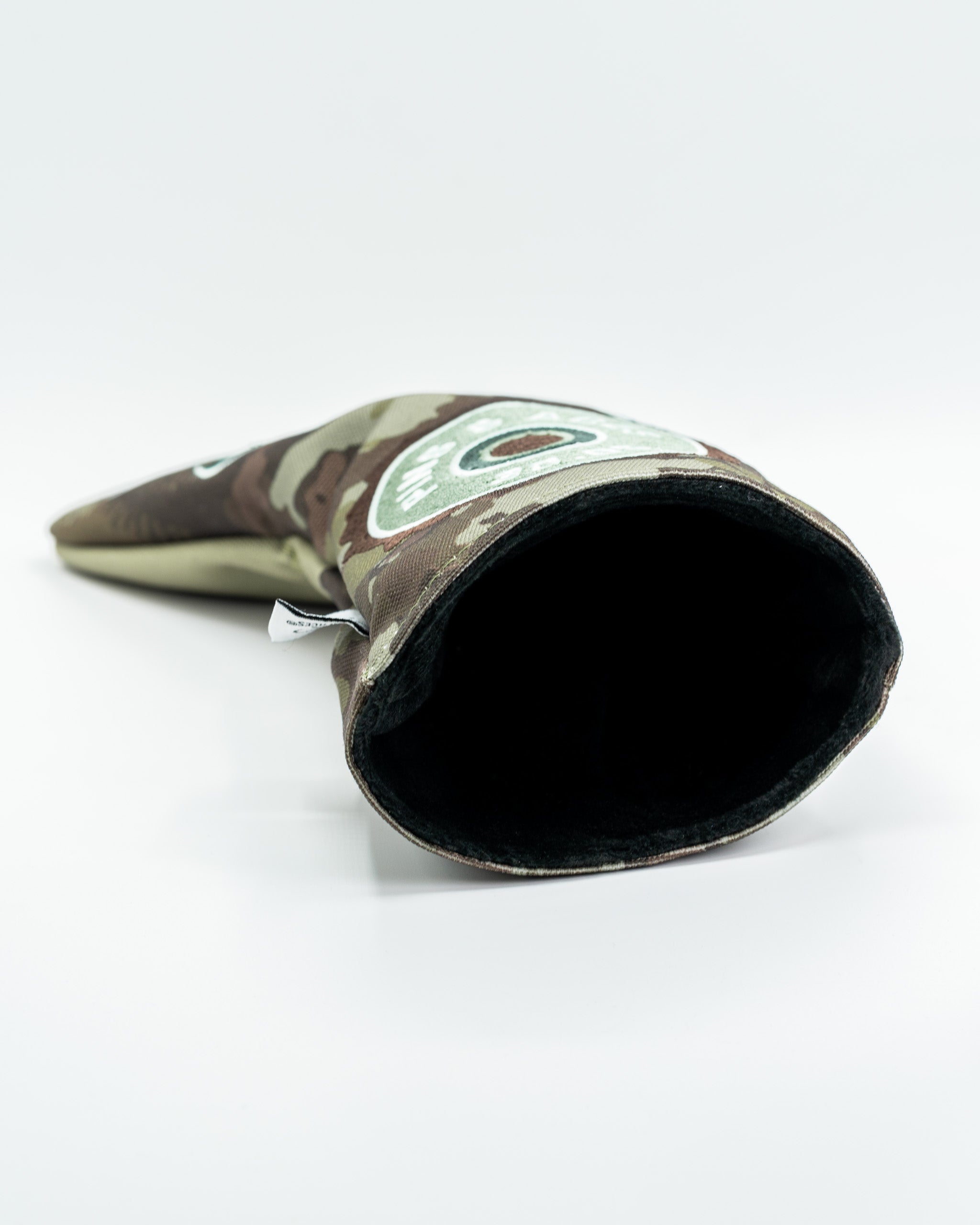 Camo-patterned driver cover featuring a moose design, designed to protect and style your golf club.