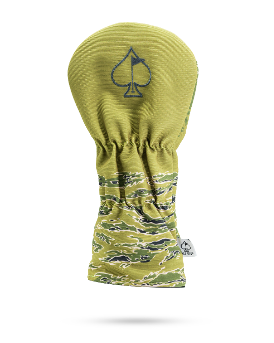 Camouflage driver cover featuring a green and brown design with a spade logo, perfect for stylish golfers.