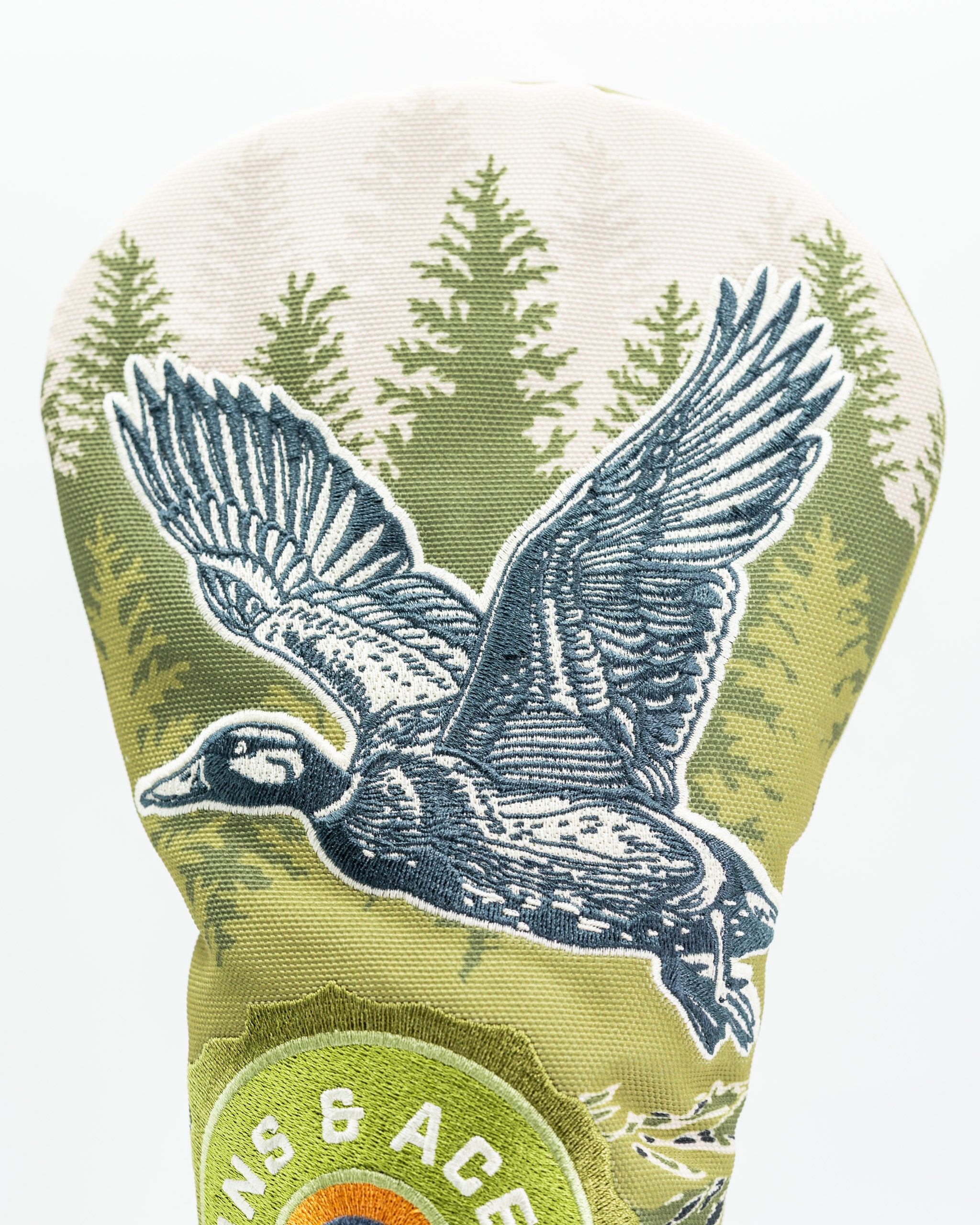 Open Season Mallard driver cover featuring a detailed flying mallard duck design against a forest backdrop.