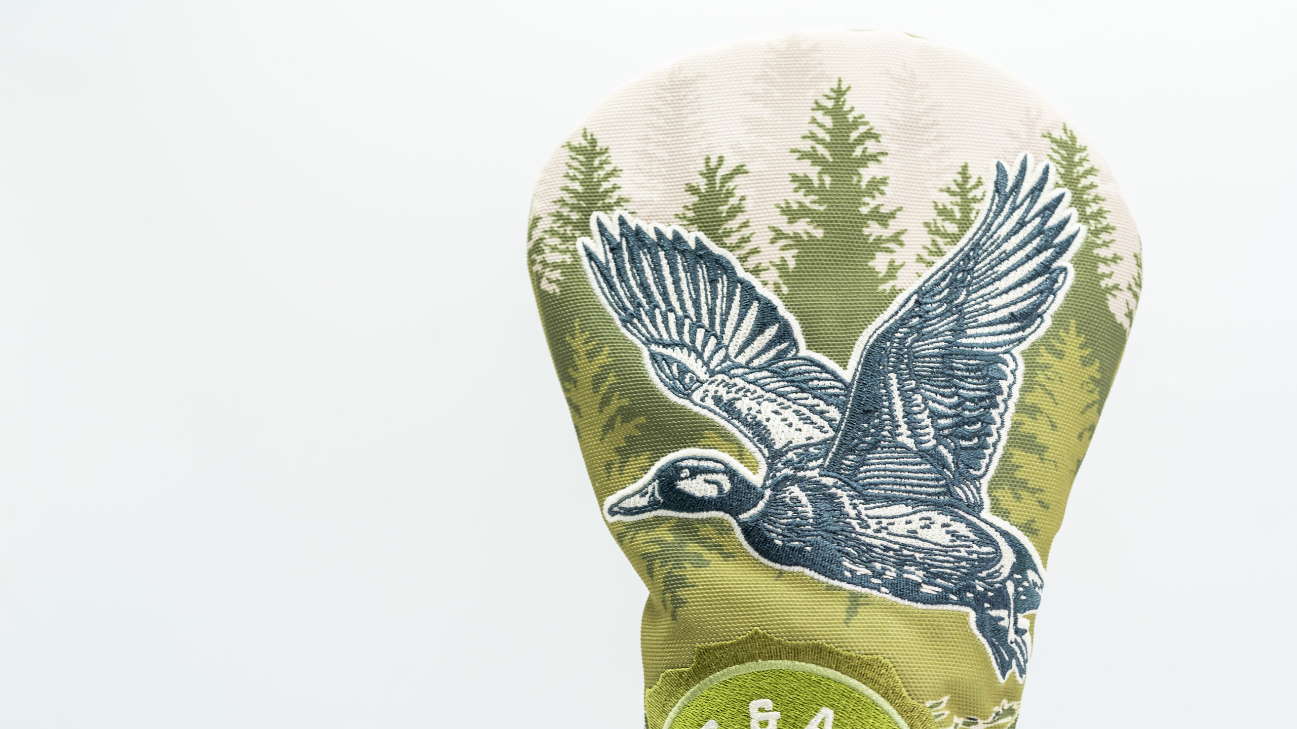 Open Season Mallard driver cover featuring a detailed flying duck design against a forest backdrop, perfect for unique golf style.