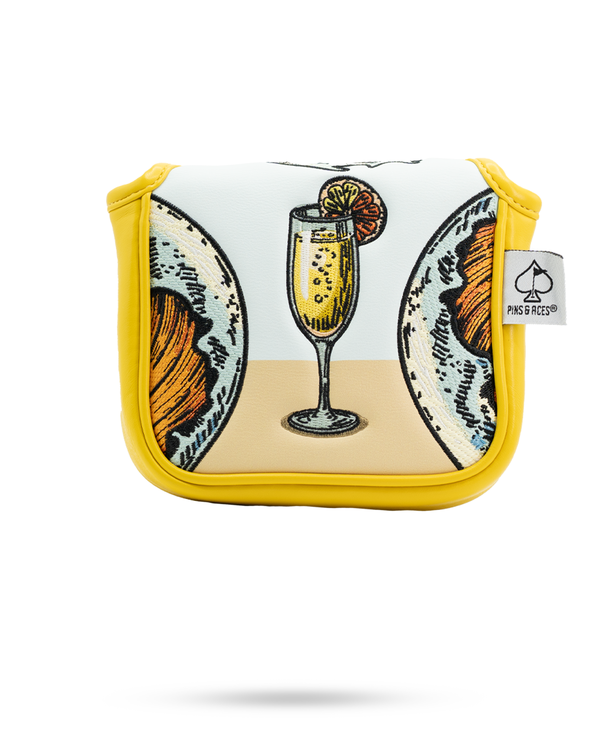 Mimosa mallet putter cover featuring a vibrant design of a cocktail glass and brunch items, perfect for stylish golfers.