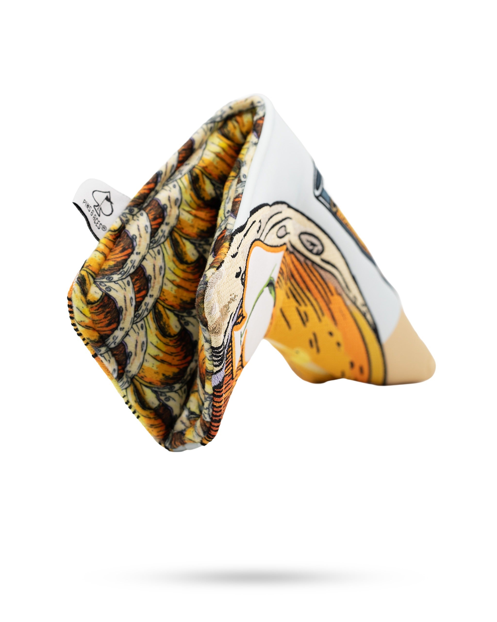 Bold blade putter cover featuring a vibrant mimosa design, perfect for golfers who want to stand out on the course.
