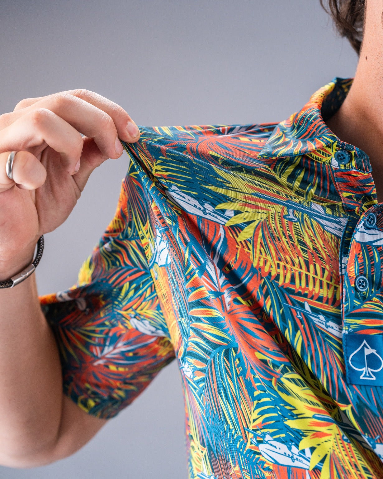 Colorful Margaritaville Bama Breeze shirt featuring a vibrant tropical print, showcasing a relaxed, stylish design.