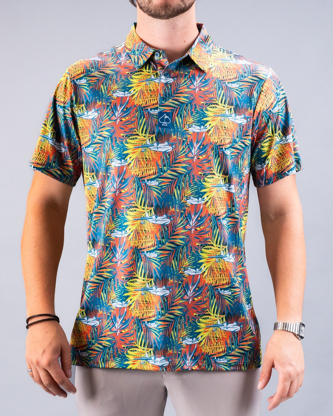 Vibrant Margaritaville Bama Breeze shirt featuring a tropical floral pattern in bright colors, perfect for summer outings.