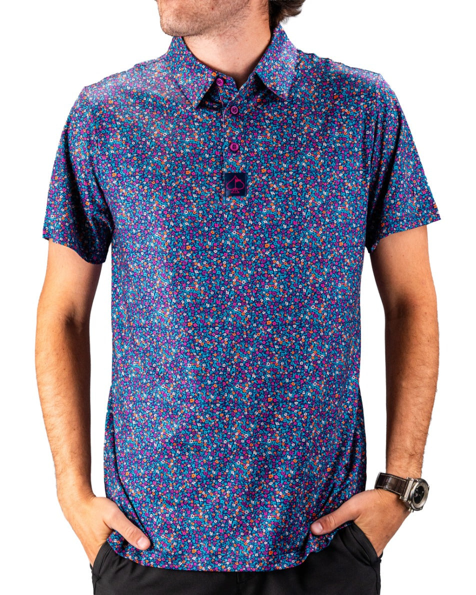Men's golf polo featuring a vibrant lavender floral pattern, designed for stylish performance on the course.