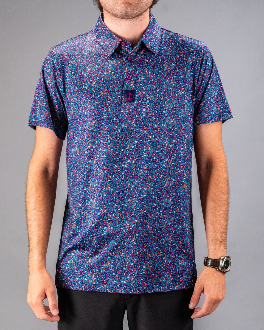 Men's short-sleeve golf polo featuring a vibrant lavender floral pattern on a dark background, perfect for stylish play.