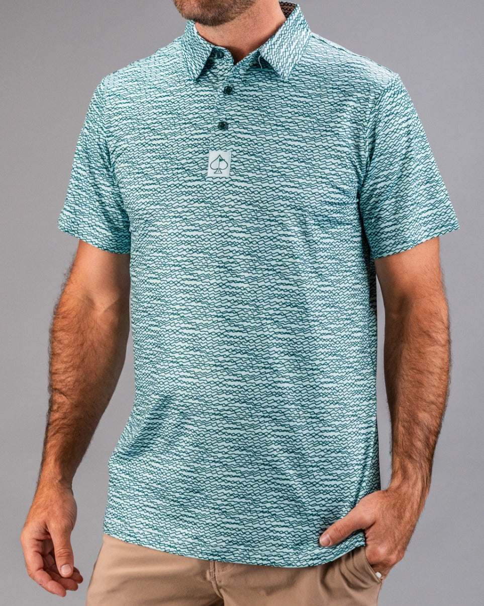 Men's teal golf shirt featuring a unique squiggle pattern, designed for comfort and style on the course.