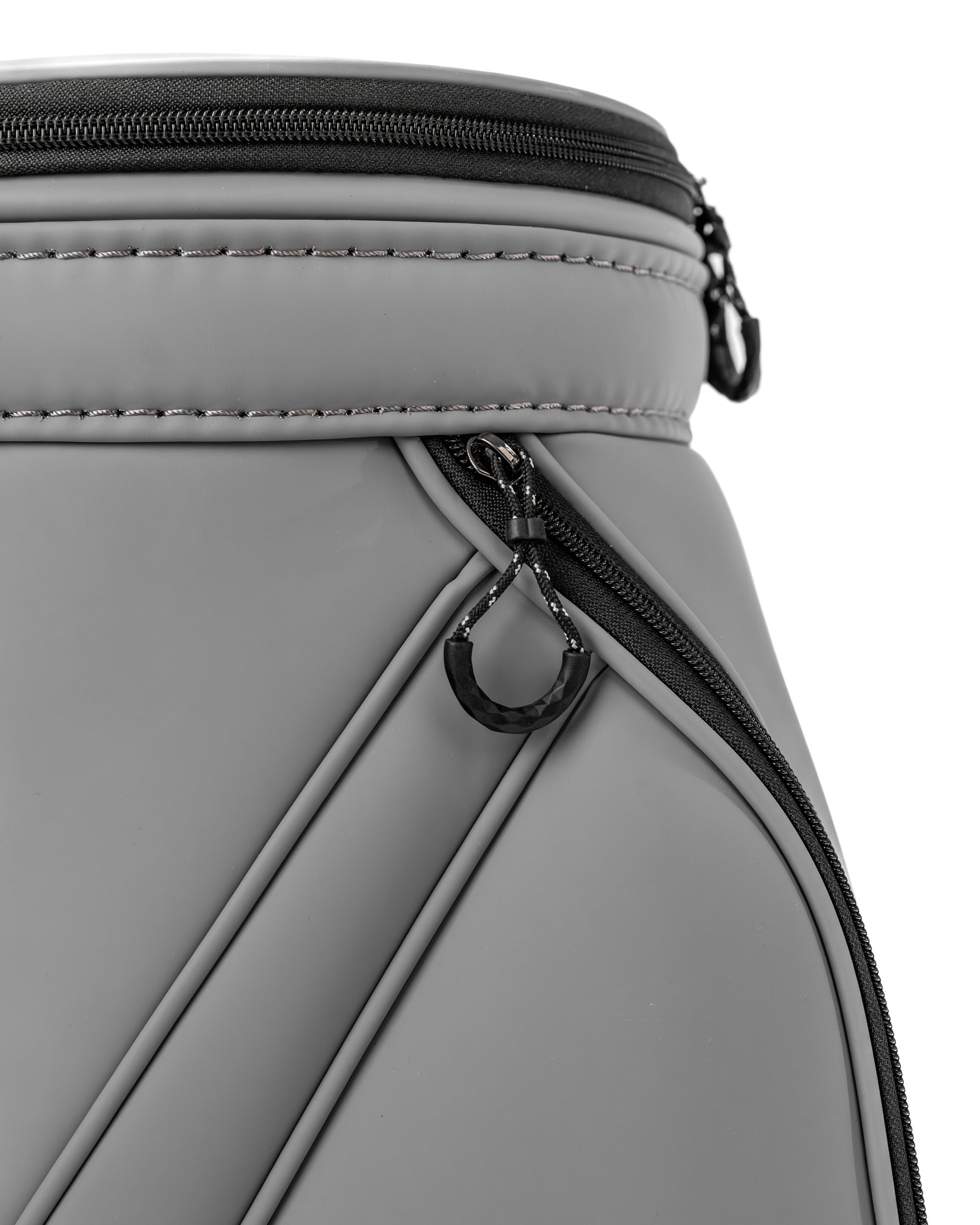 Close-up of the Den Caddy in Flat Ash, showcasing its sleek design and zipper detail for stylish golf storage.
