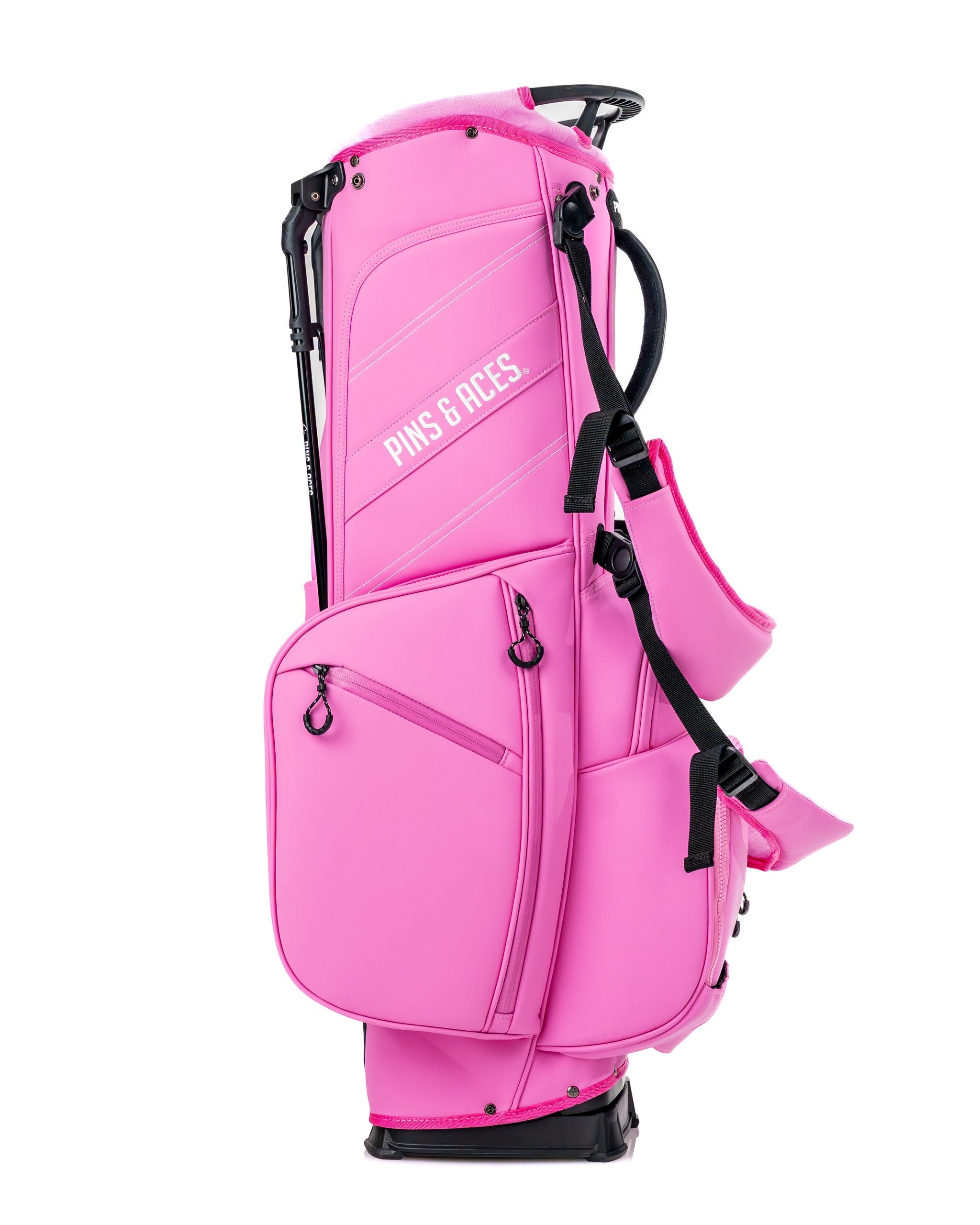 Bold pink Player Preferred Golf Bag from Pins and Aces, featuring multiple pockets and a sleek design for stylish golfers.