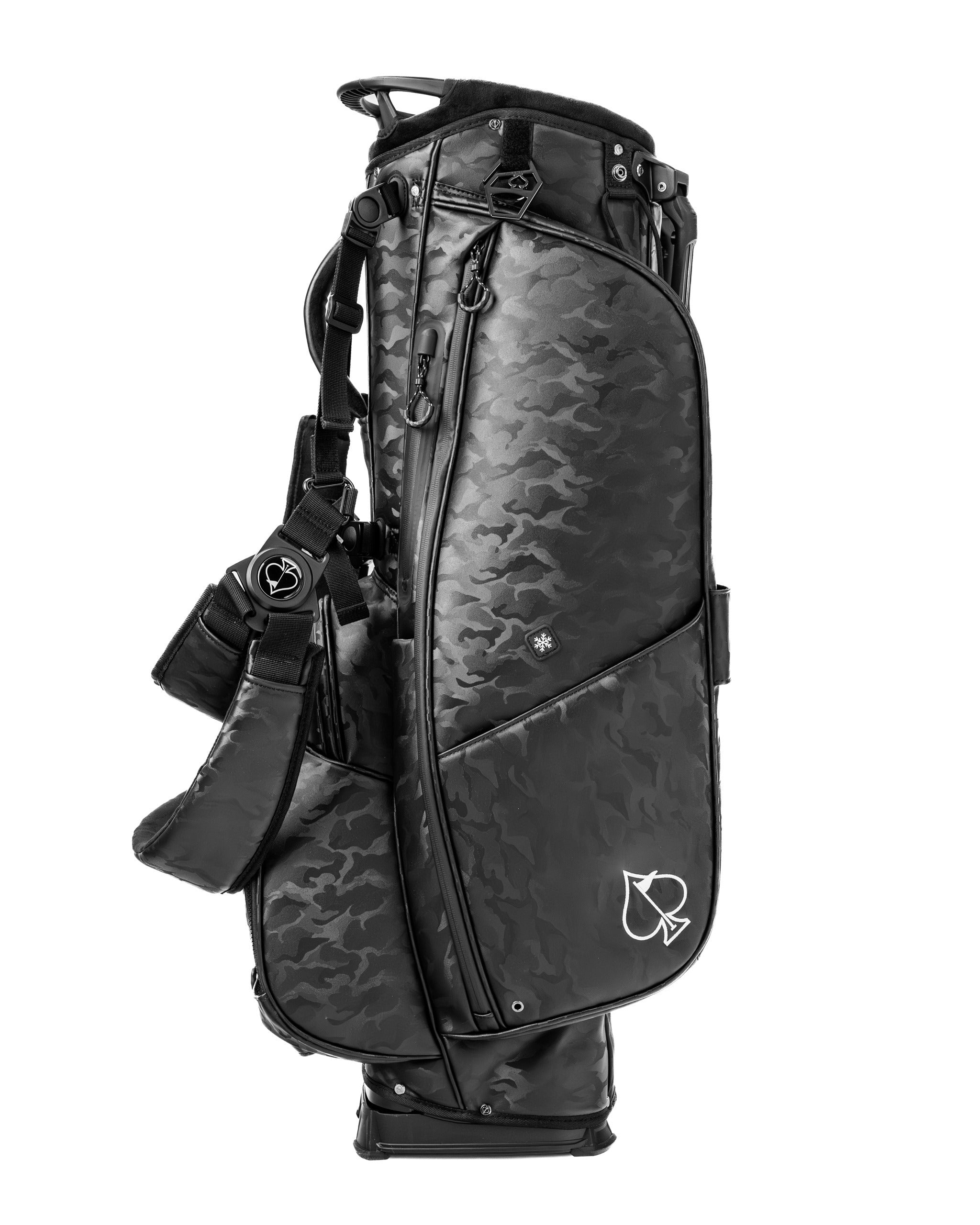 Sleek black camo golf bag featuring multiple pockets and a comfortable strap for easy carrying on the course.
