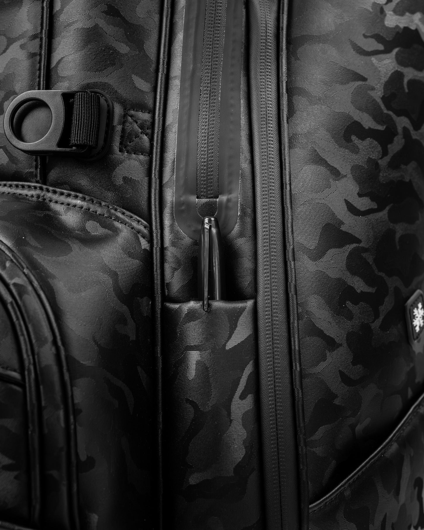 Close-up of the Player Preferred Golf Bag in black camo, showcasing its durable material and zipper detail.