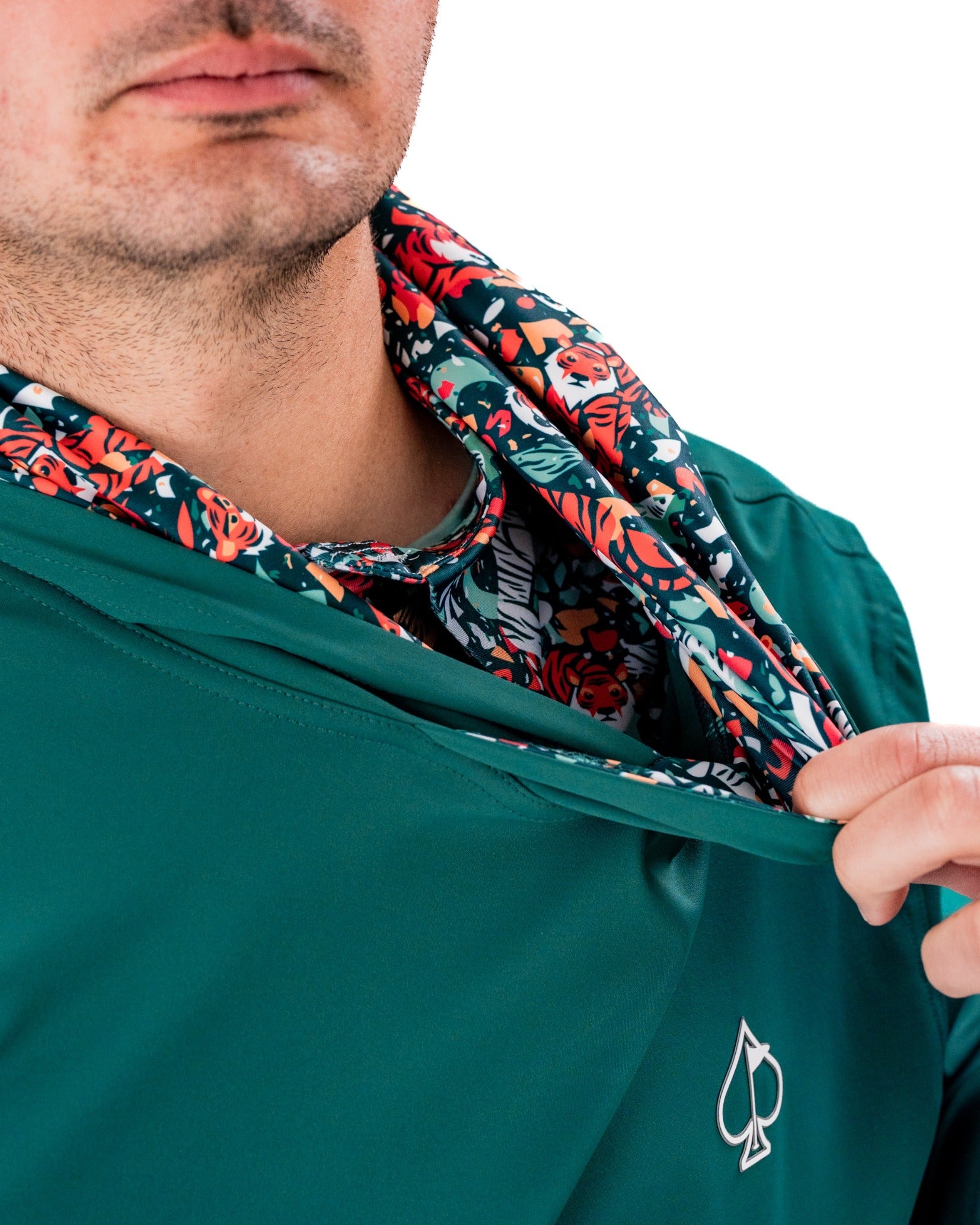 Performance Golf Hoodie in Tiger Shatter Teal featuring a vibrant floral inner lining, perfect for stylish golfers.