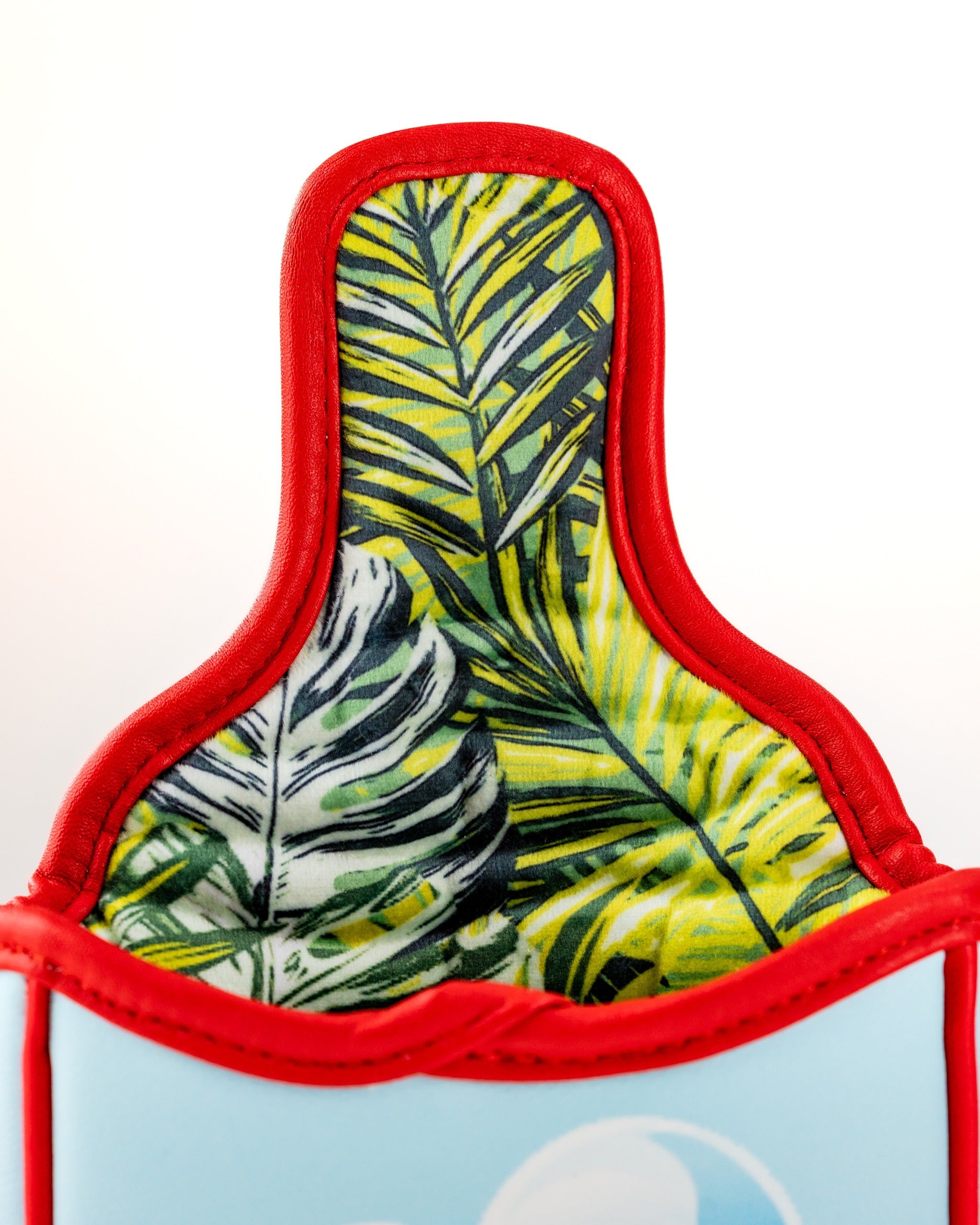 Margaritaville Puddle Jumper mallet putter cover featuring vibrant tropical leaf design and red trim for stylish protection.
