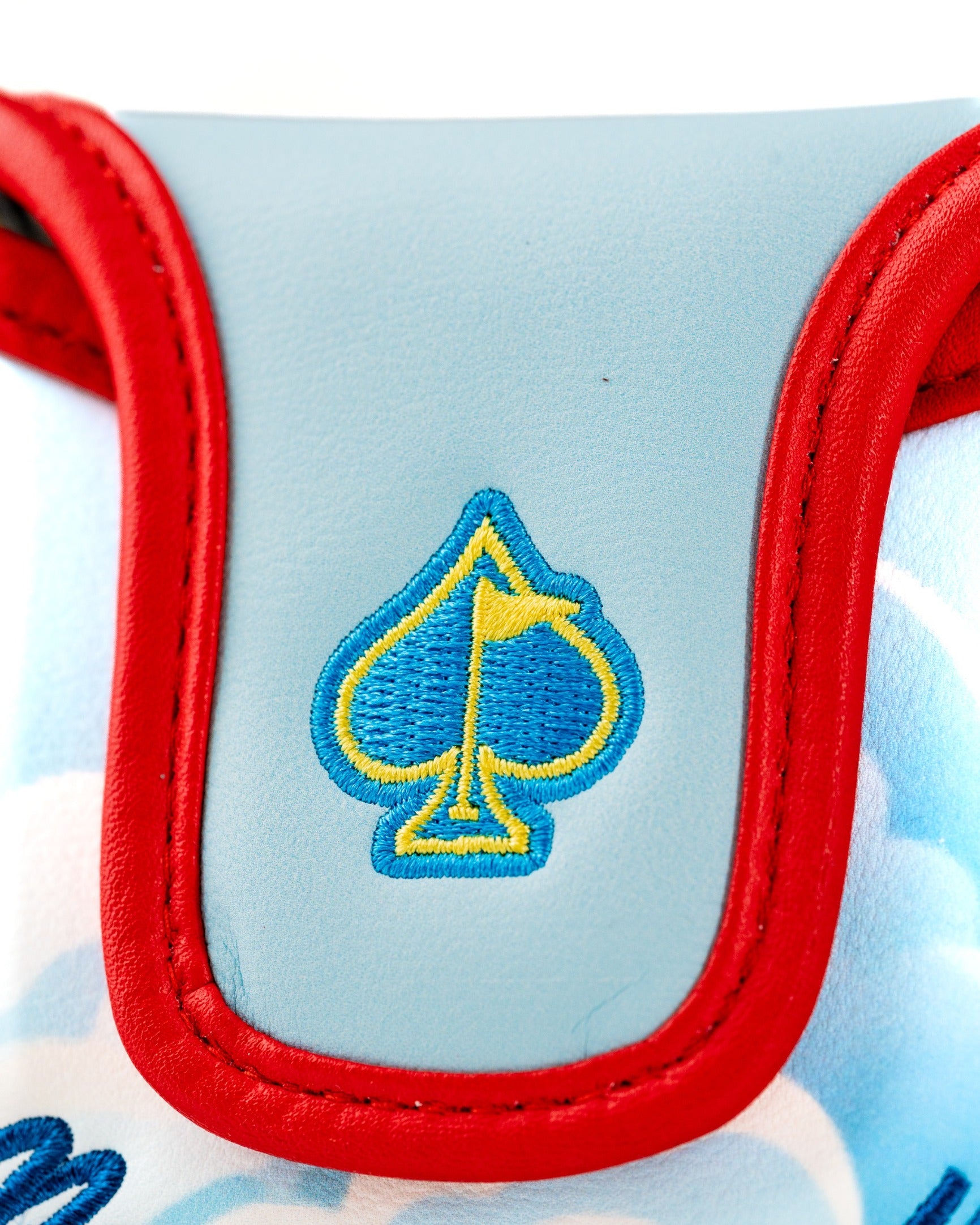 Margaritaville Puddle Jumper mallet putter cover with blue and red design featuring a spade logo for stylish golf protection.