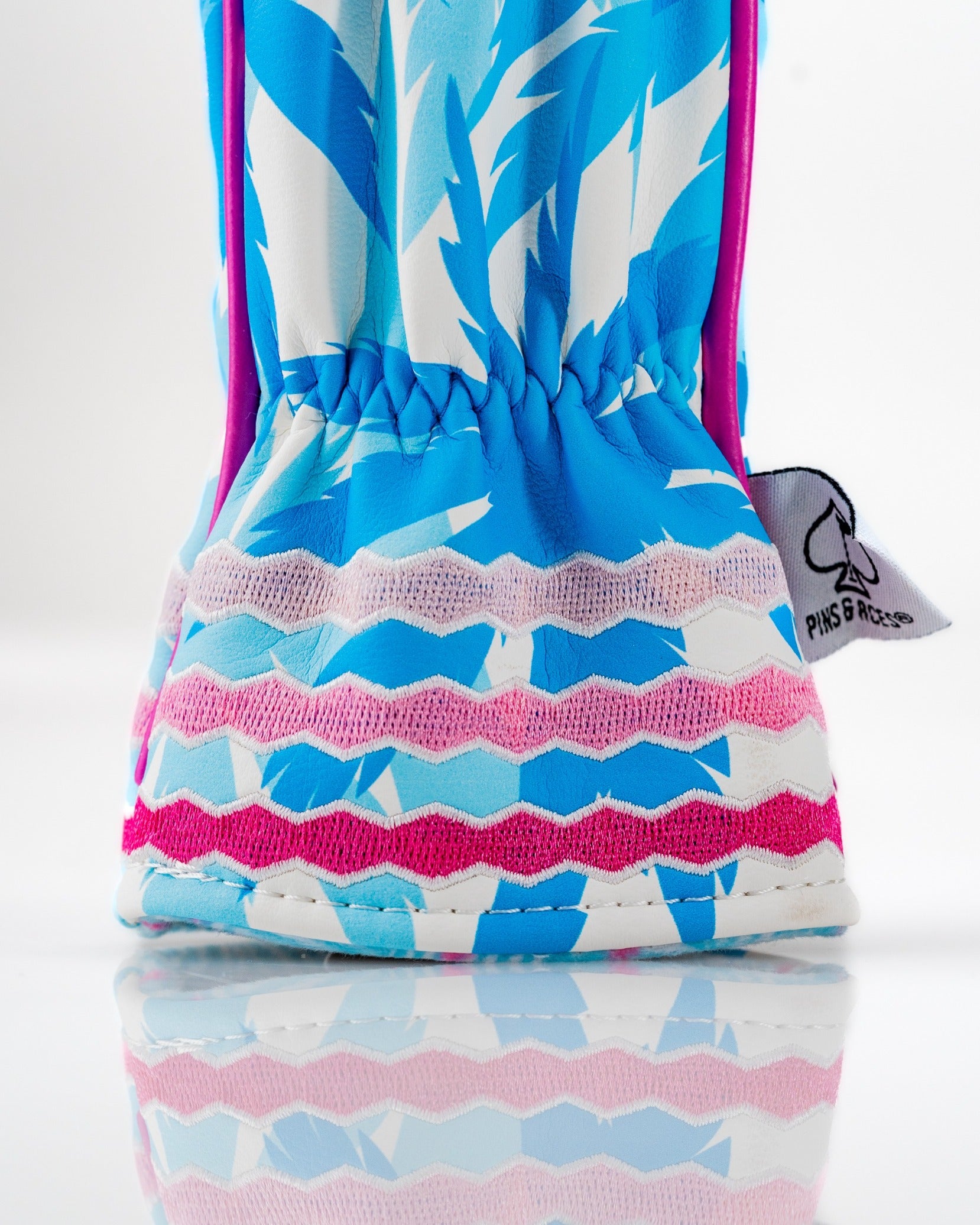 Colorful flamingo-patterned hybrid golf club cover with a snug fit and vibrant design, perfect for stylish golfers.