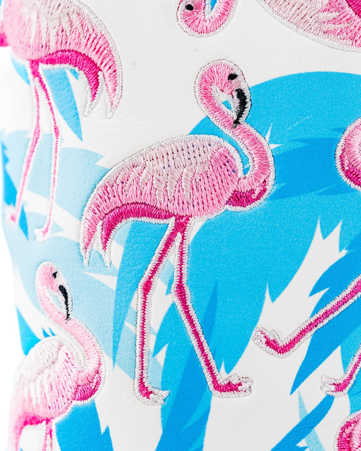 Brightly colored hybrid cover featuring embroidered pink flamingos on a blue background, perfect for adding flair to golf gear.