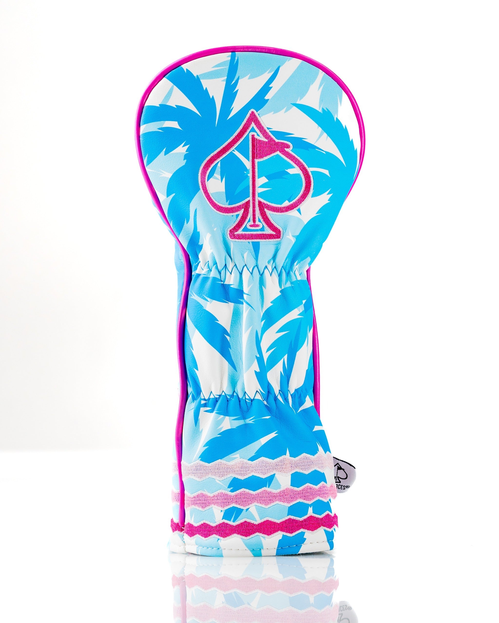 Bright blue and pink flamingo-themed fairway cover featuring palm leaves and a spade logo, designed for stylish golfers.