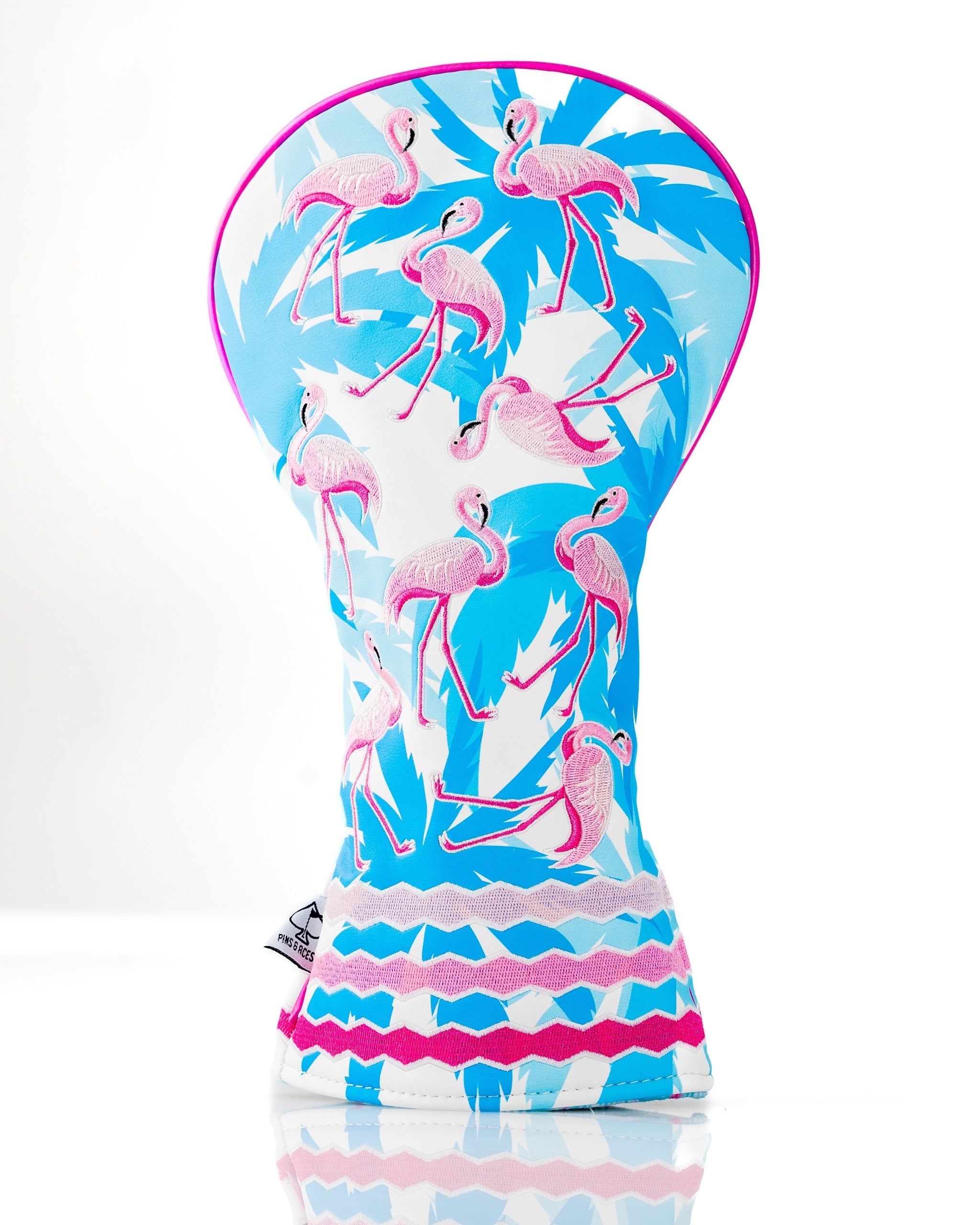 Colorful driver cover featuring a vibrant flamingo pattern against a tropical backdrop, designed for stylish golfers.
