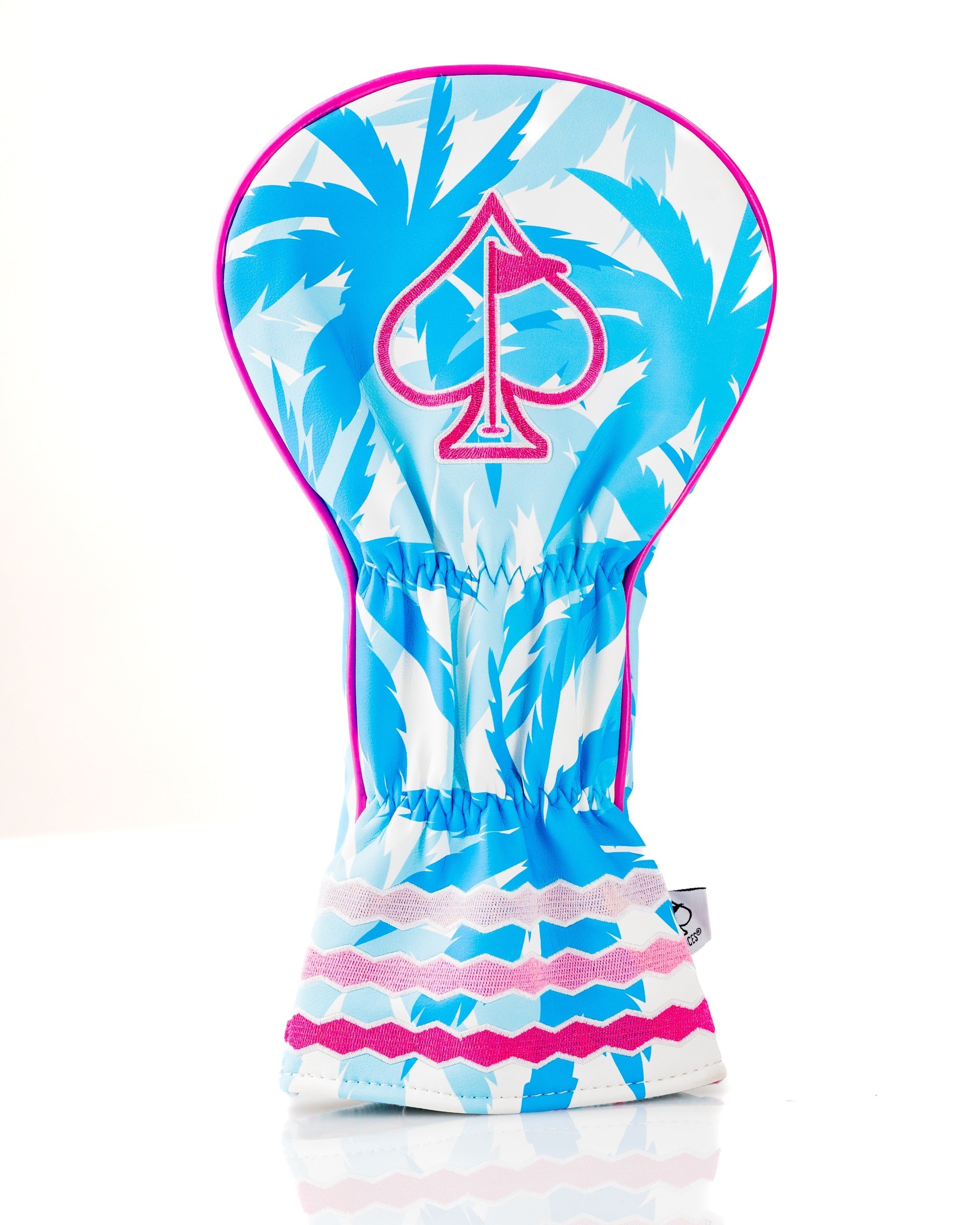 Bold flamingo-patterned driver cover featuring a spade logo, designed to add flair to your golf gear.