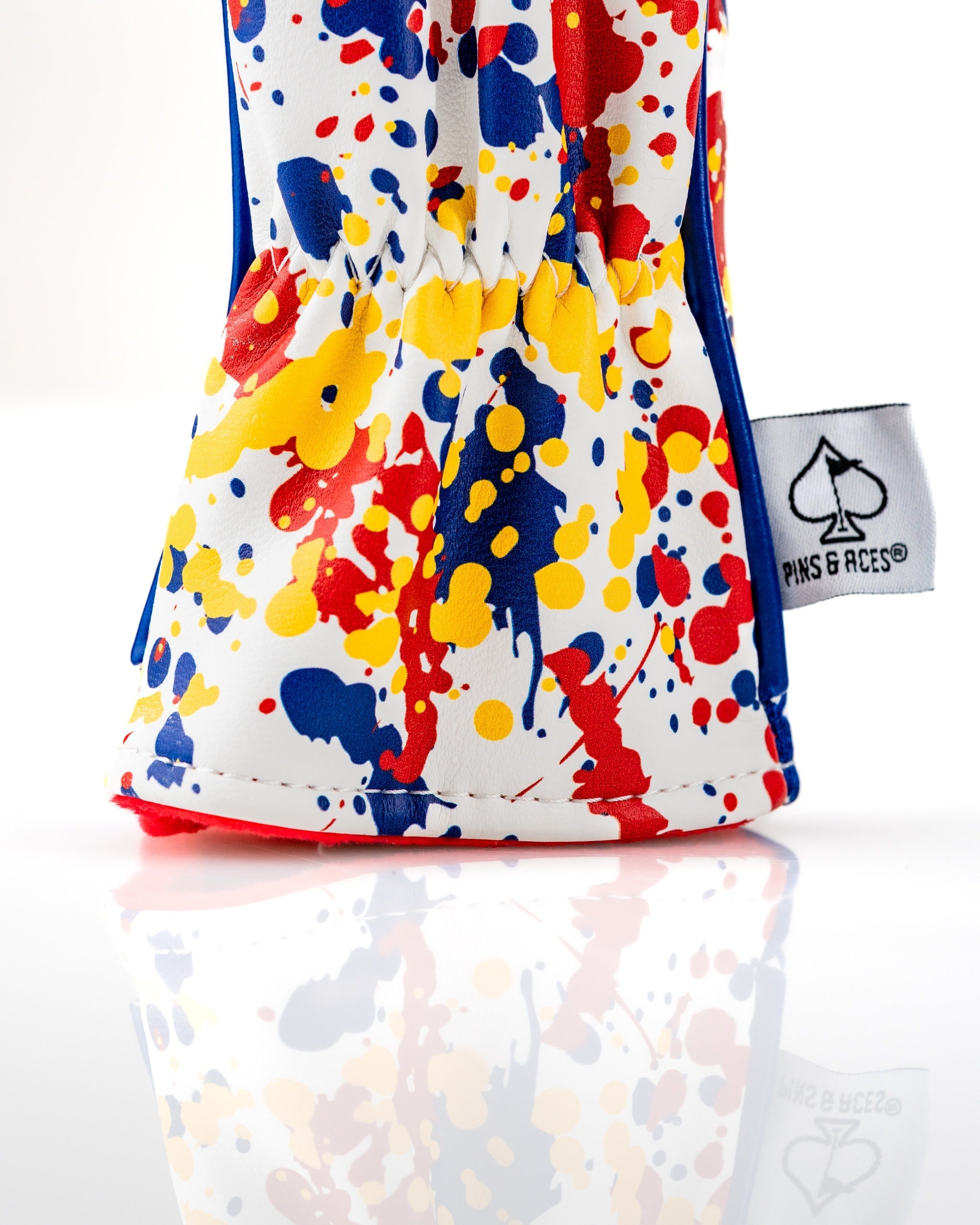 Colorful Colorado 2.0 hybrid cover featuring a vibrant splatter design, perfect for adding style to your golf bag.
