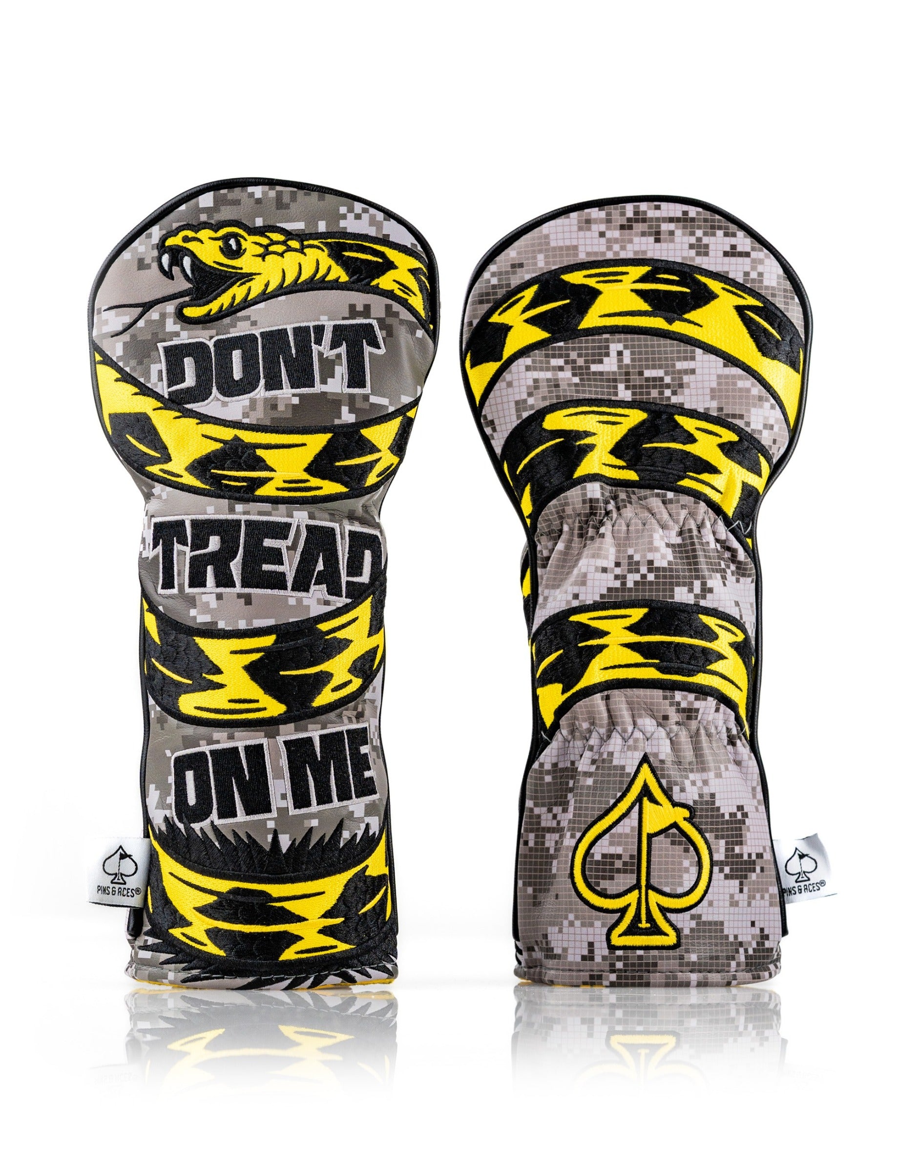 Bold camo fairway cover featuring "Don't Tread On Me" text and striking yellow accents for standout golf style.