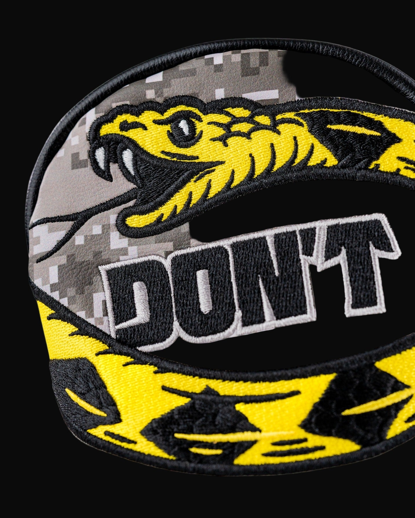 Bold golf hybrid cover featuring a striking yellow snake design and "DON'T" text, perfect for golfers who stand out.