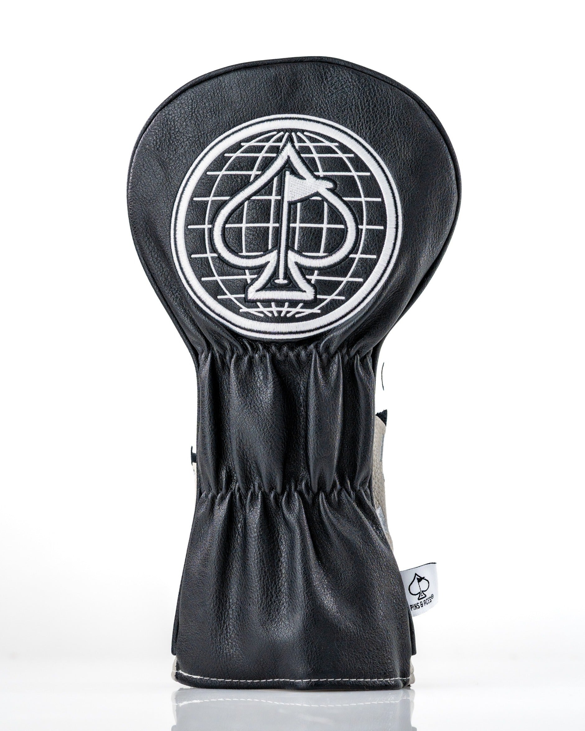 Stylish black driver cover featuring a white spade logo, designed for golfers who want to make a bold statement on the course.